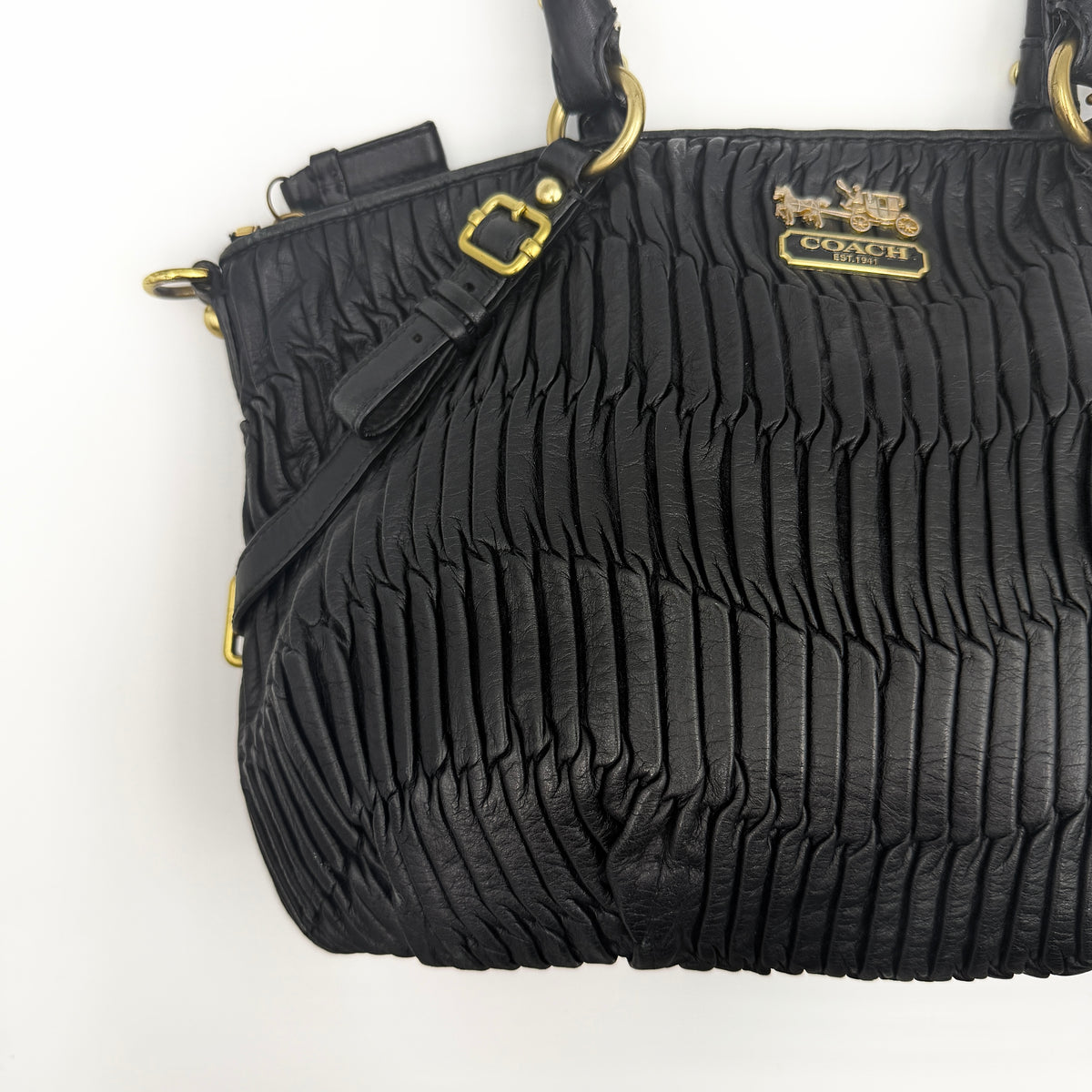 Coach Sophia Madison Pleated Shoulder Bag in black leather with gold hardware, displayed with detachable strap and dust bag.
