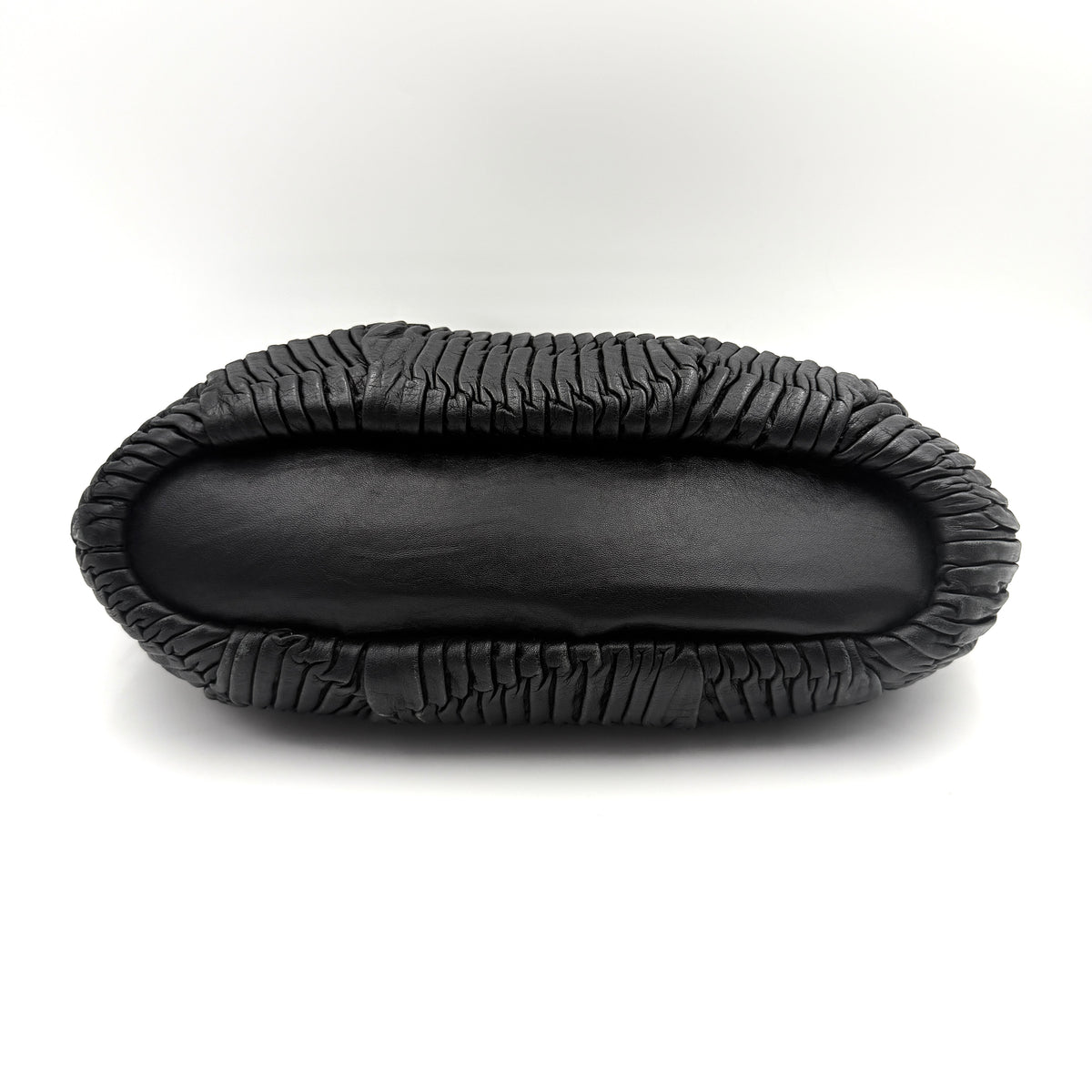 Coach Sophia Madison Pleated Shoulder Bag in black leather with gold hardware, displayed with detachable strap and dust bag.