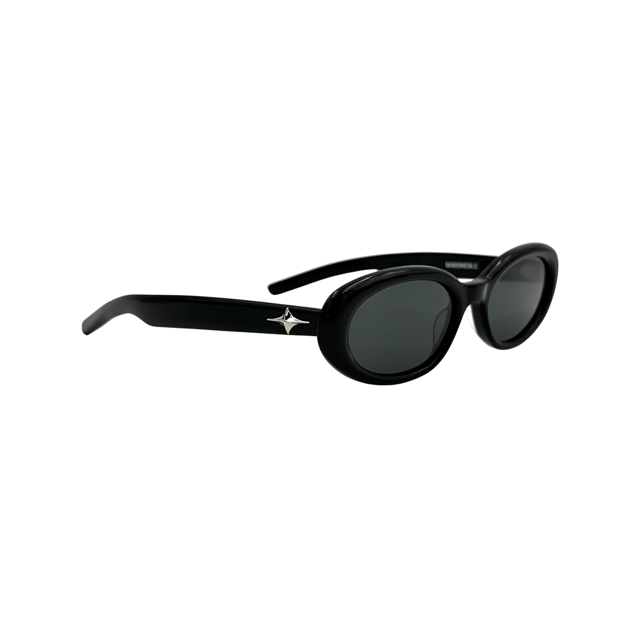 Gentle Monster Bandoneon.S sunglasses in black acetate with dark oval lenses and silver star accents shown from the side.