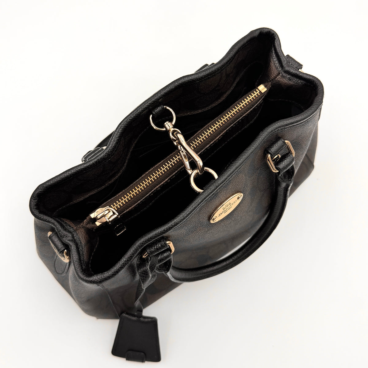 Coach 2Way Signature Margot Carryall Satchel in brown with black leather handles and gold hardware, shown with detachable strap.