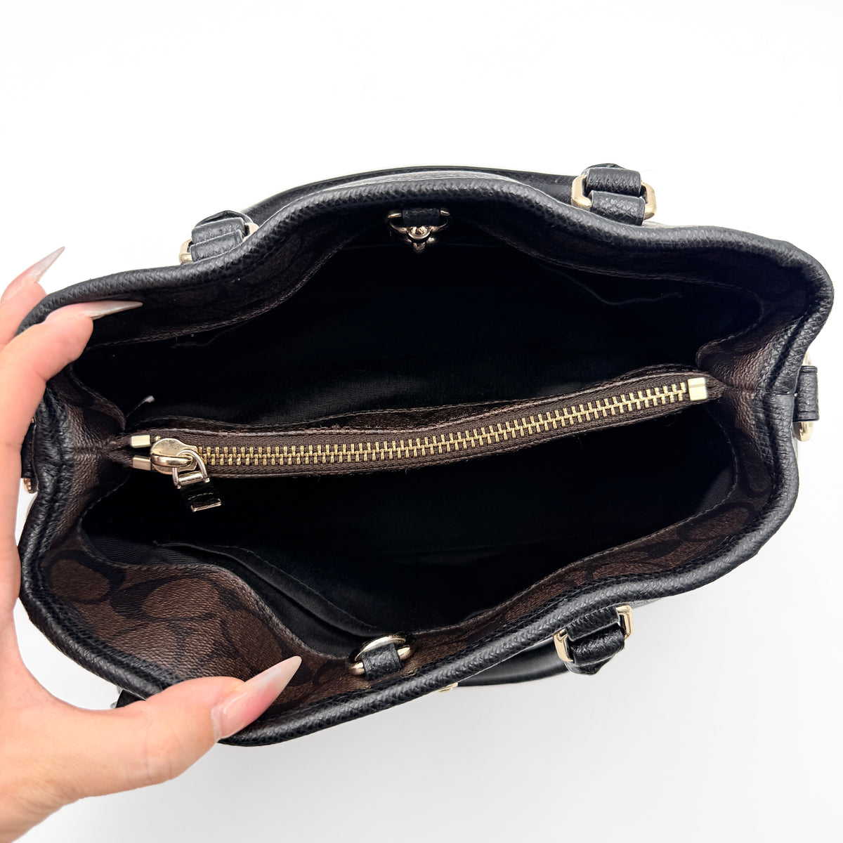 Coach 2Way Signature Margot Carryall Satchel in brown with black leather handles and gold hardware, shown with detachable strap.