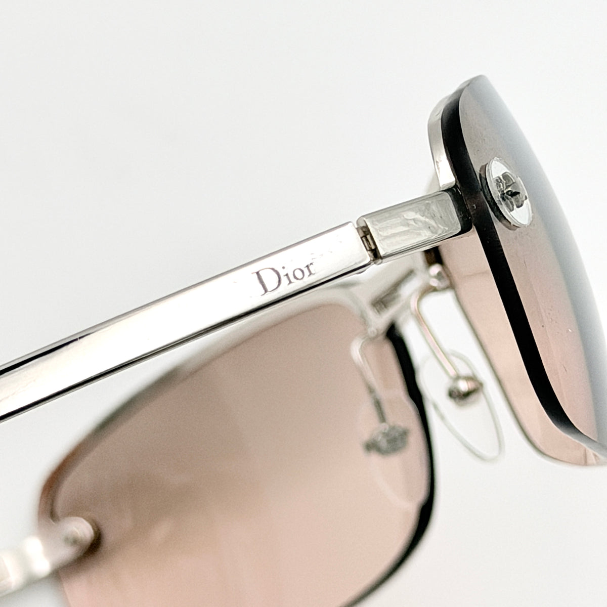 Dior Adiorable 3/L rimless sunglasses with rose pink gradient lenses and silver frame, presented with Dior hard case.