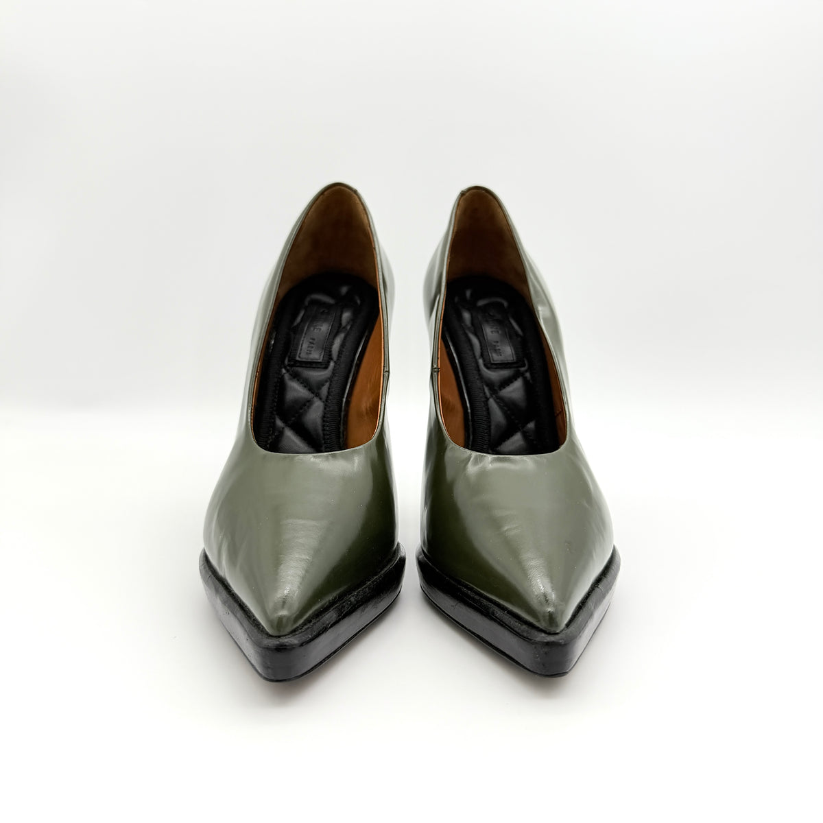 Celine olive green leather heels with pointed toe and black stiletto heel, displayed against a white background