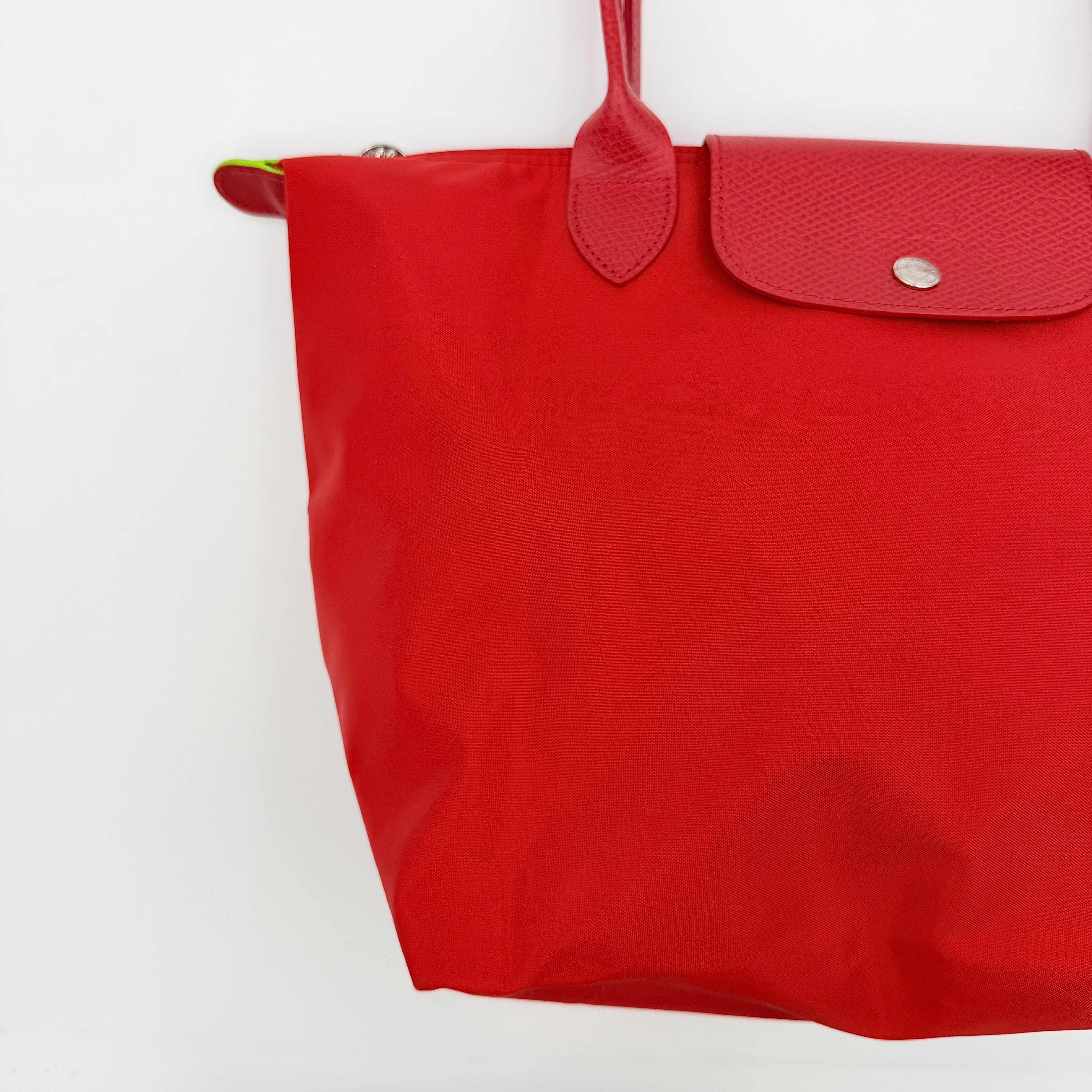 Longchamp Le Pliage Club tote bag in red nylon with tonal leather accents and silver hardware.