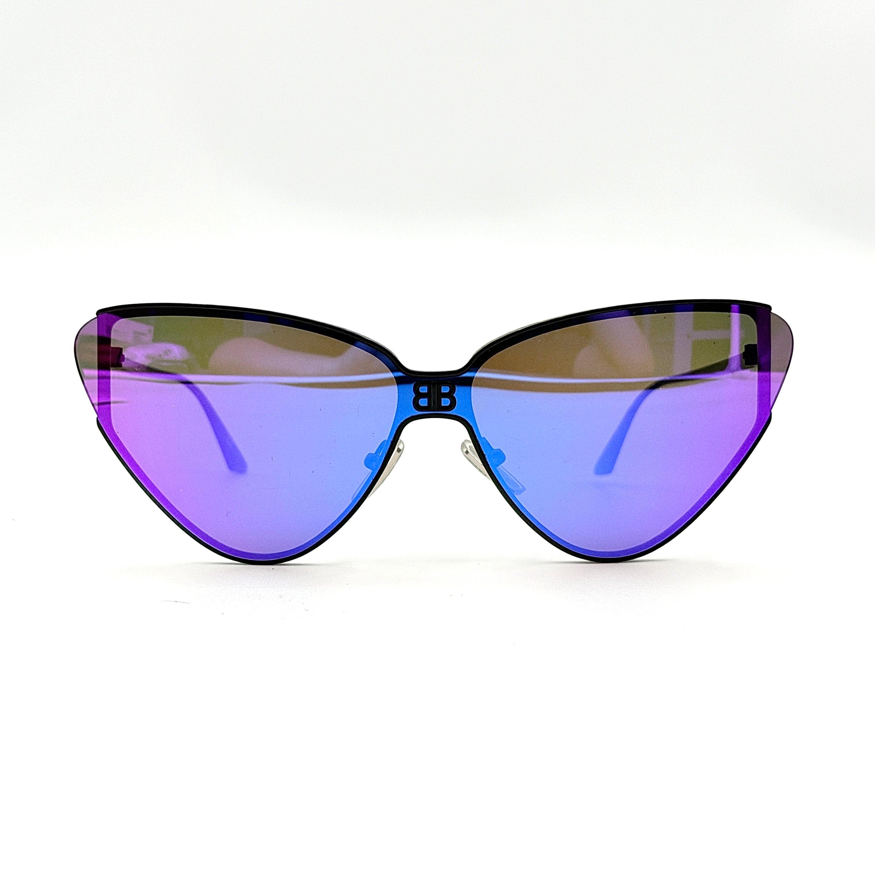 Balenciaga cat-eye sunglasses with purple mirrored lenses and black frame, featuring signature BB logo at the bridge.