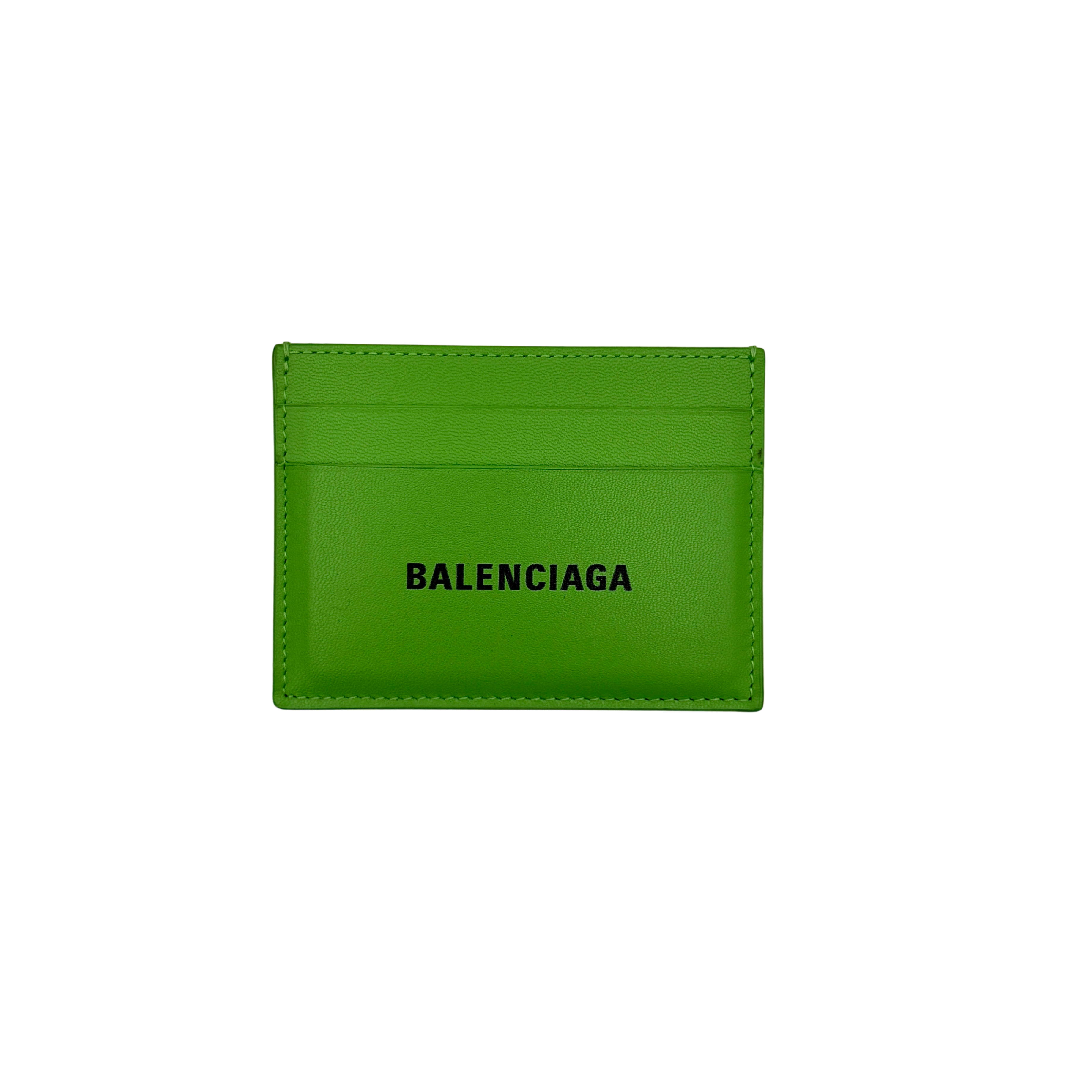 A vivid green Balenciaga leather cardholder featuring a bold black logo and minimalist silhouette.