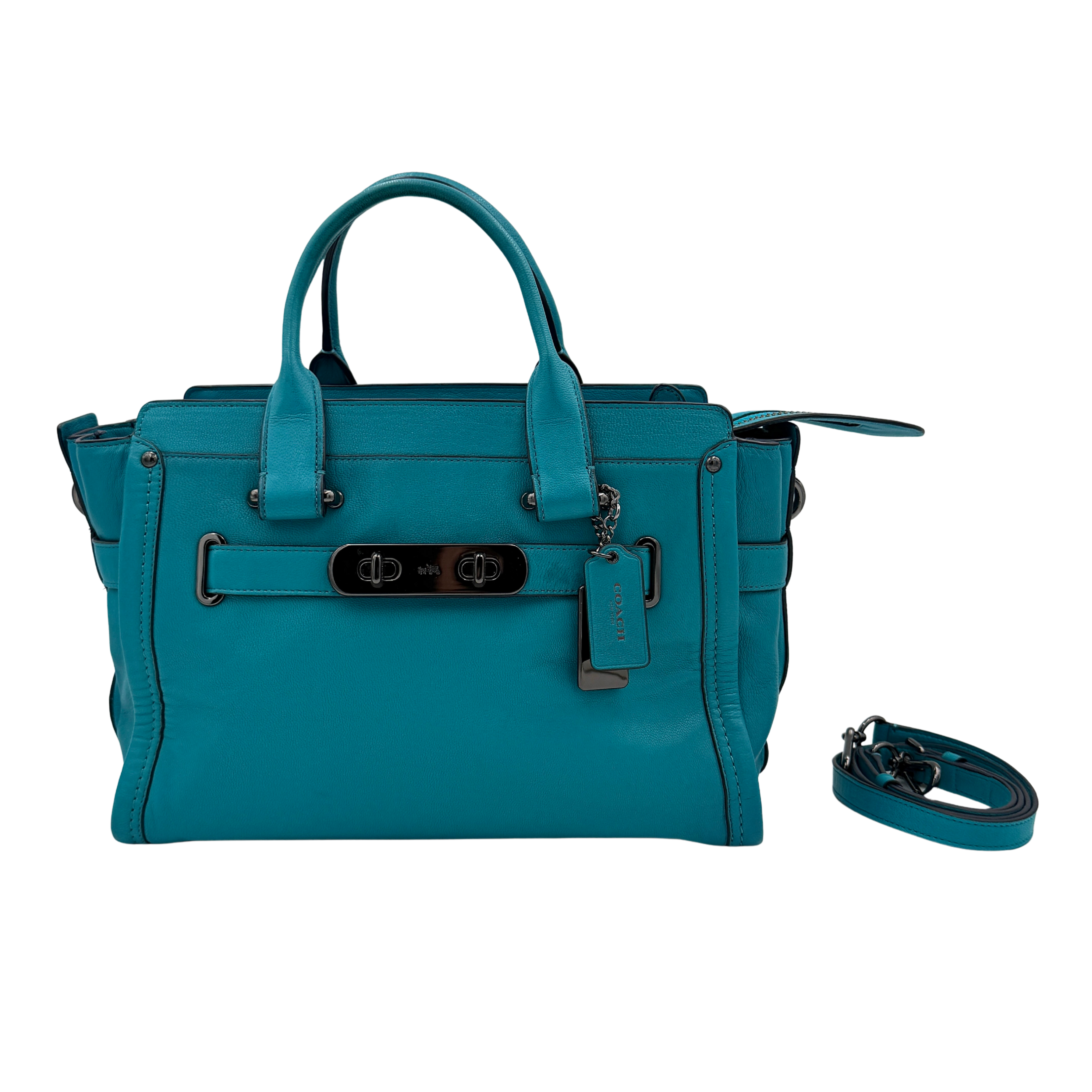 Coach Swagger 27 Carryall in vivid turquoise leather with double top handles, gunmetal hardware, and detachable strap.