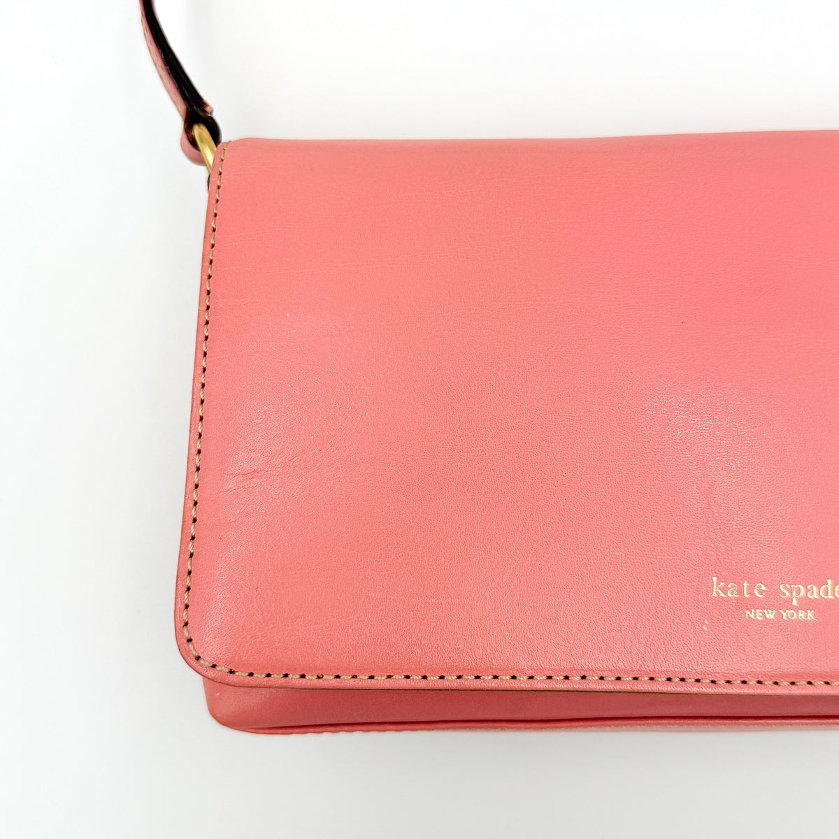 Kate Spade Morgan East West Shoulder Bag in smooth pink leather with gold-tone hardware and a green interior, displayed on white background.