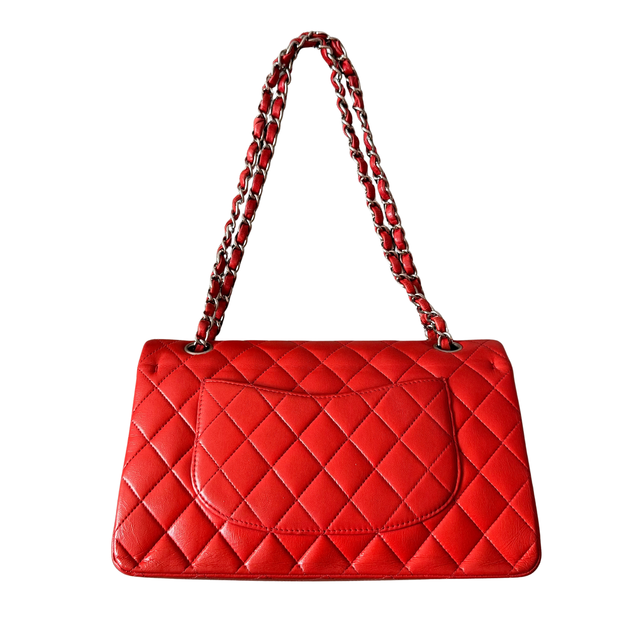 Chanel double flap shoulder bag in quilted red leather with silver-tone hardware and chain leather strap.