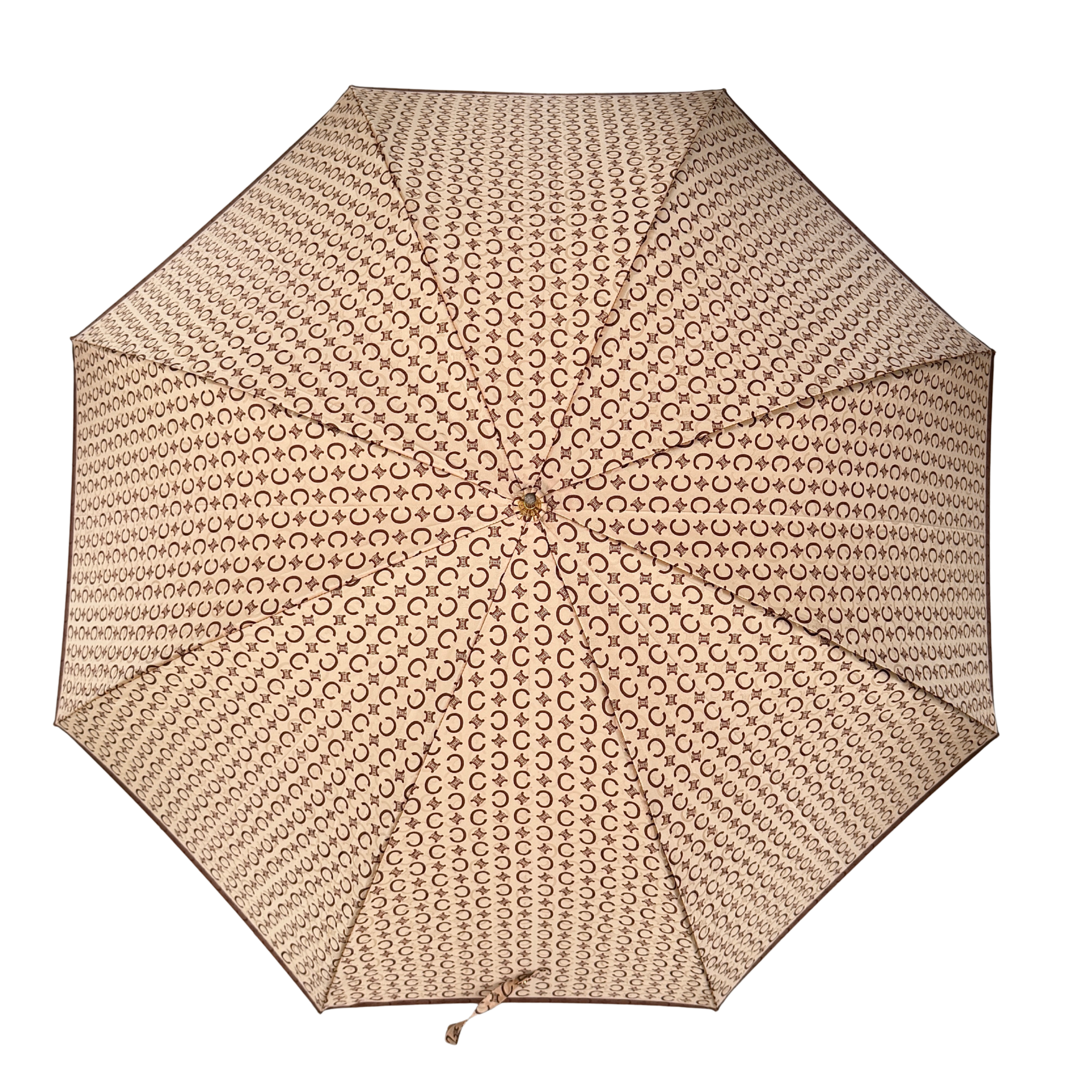 Celine Macadam Monogram Umbrella in brown and beige with classic curved handle and signature all-over logo pattern.