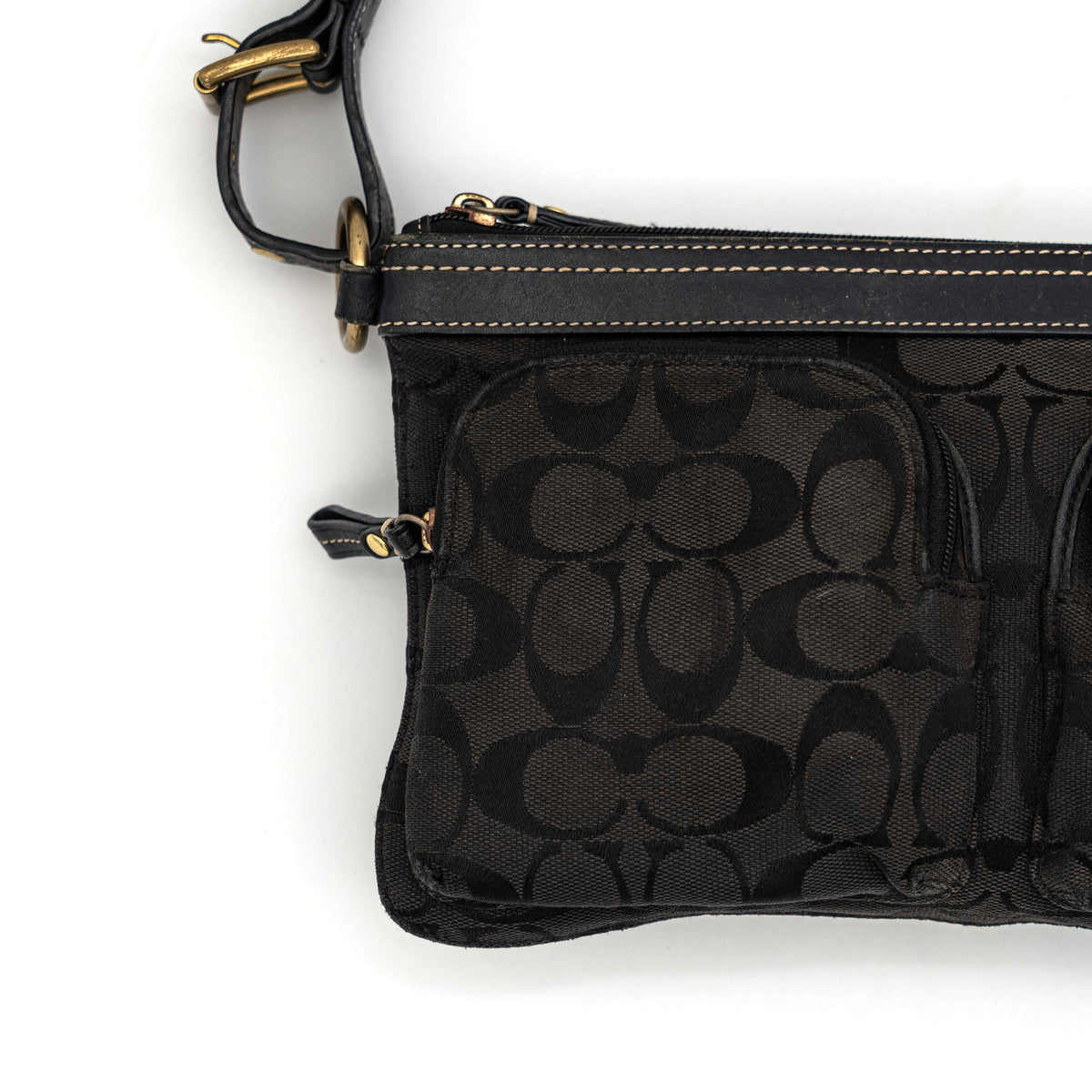 Coach Signature Double Pocket Shoulder Bag in black jacquard with dual zip pockets and an adjustable leather strap.