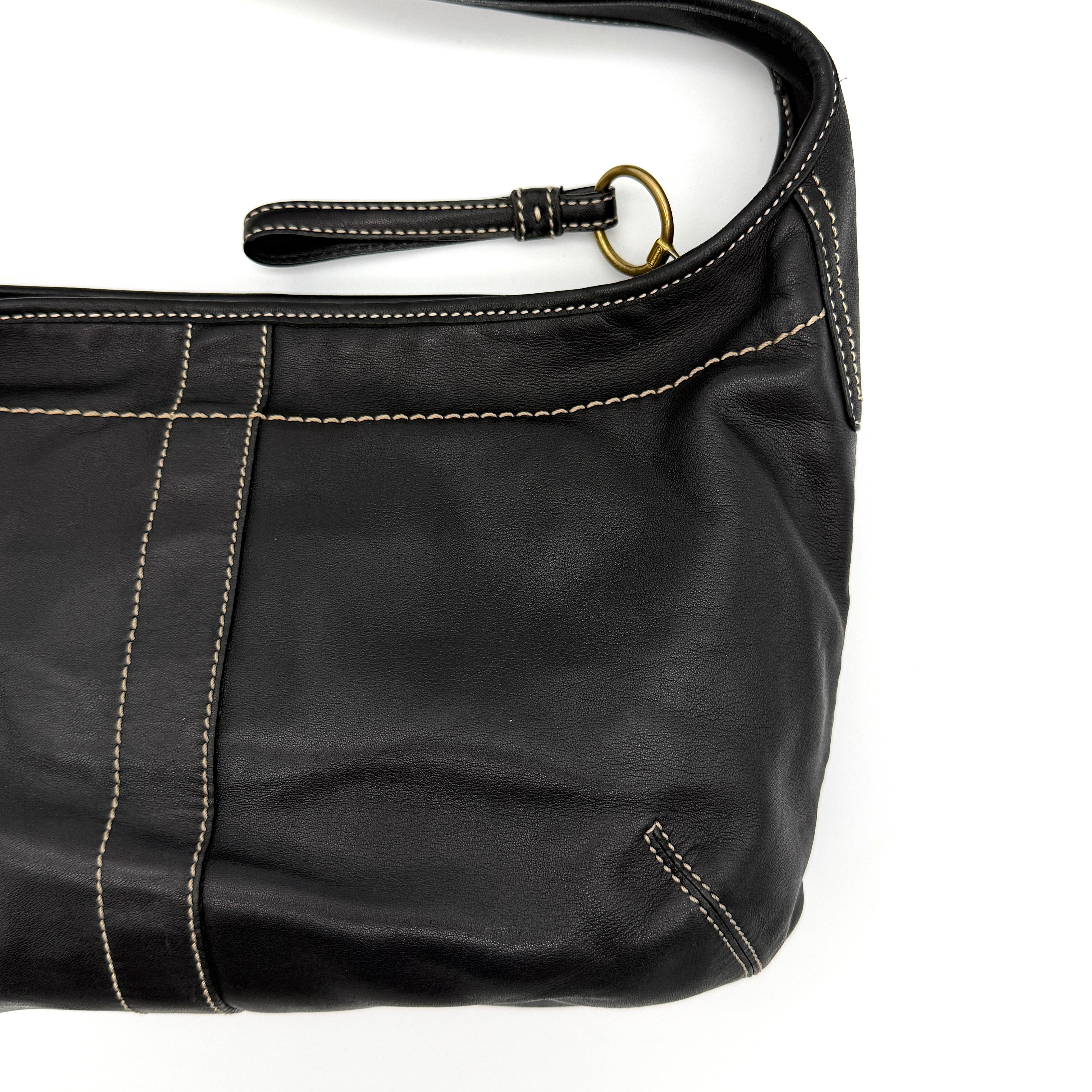 Coach Signature Ergo Hobo Shoulder Bag in black leather with contrast stitching and brass hardware, displayed against a white background.