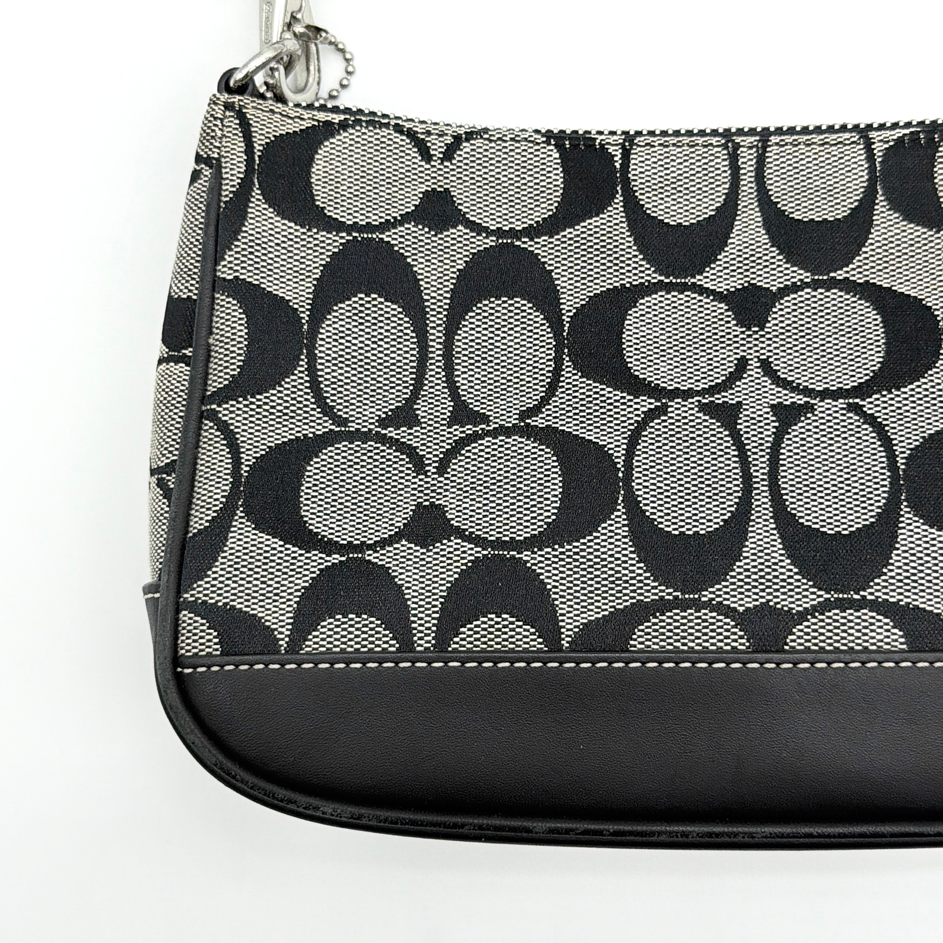 Coach Y2K Demi Shoulder Bag in grey and black signature jacquard with leather trim and silver hardware.