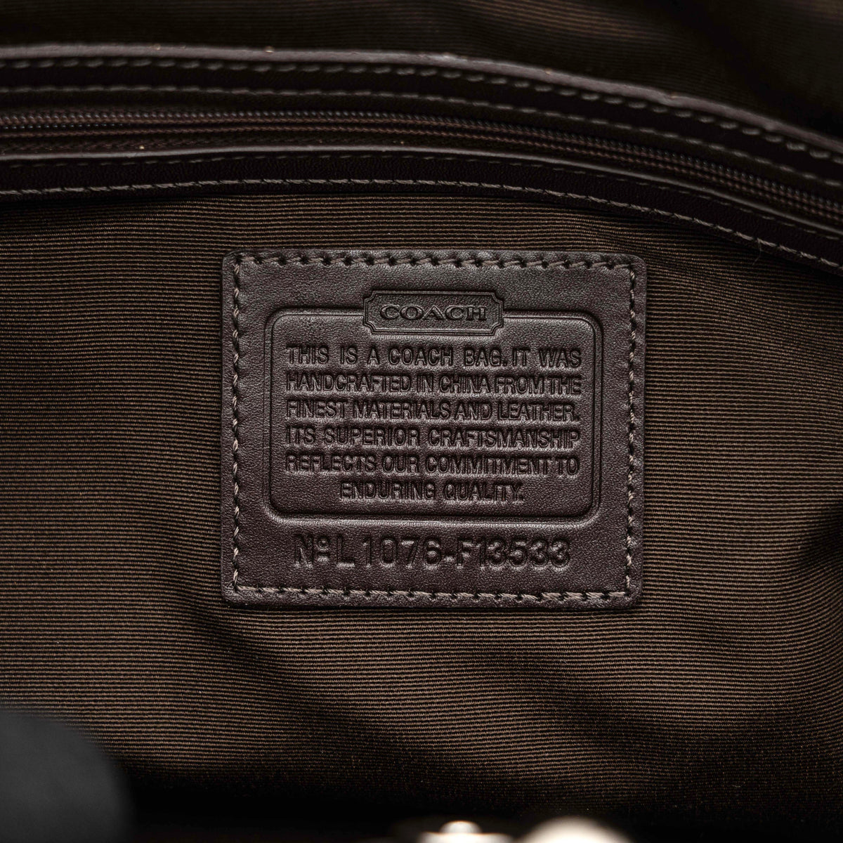 Coach Signature Stripe Frame Kisslock Shoulder Bag in beige and brown canvas with leather trim and signature monogram pattern.