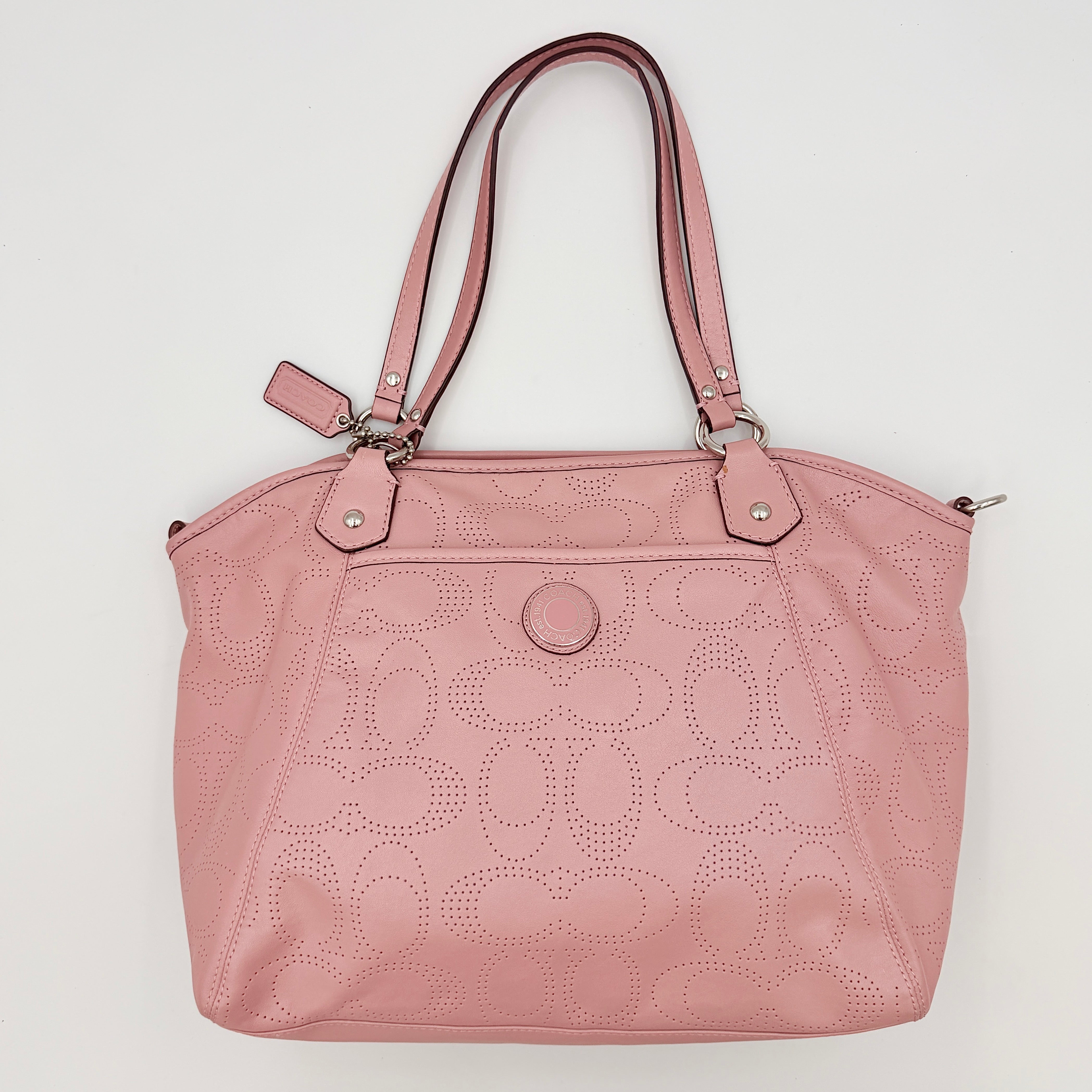 Coach 2Way Perforated Shoulder Bag in soft pink leather with silver hardware and detachable strap, displayed on a white background.