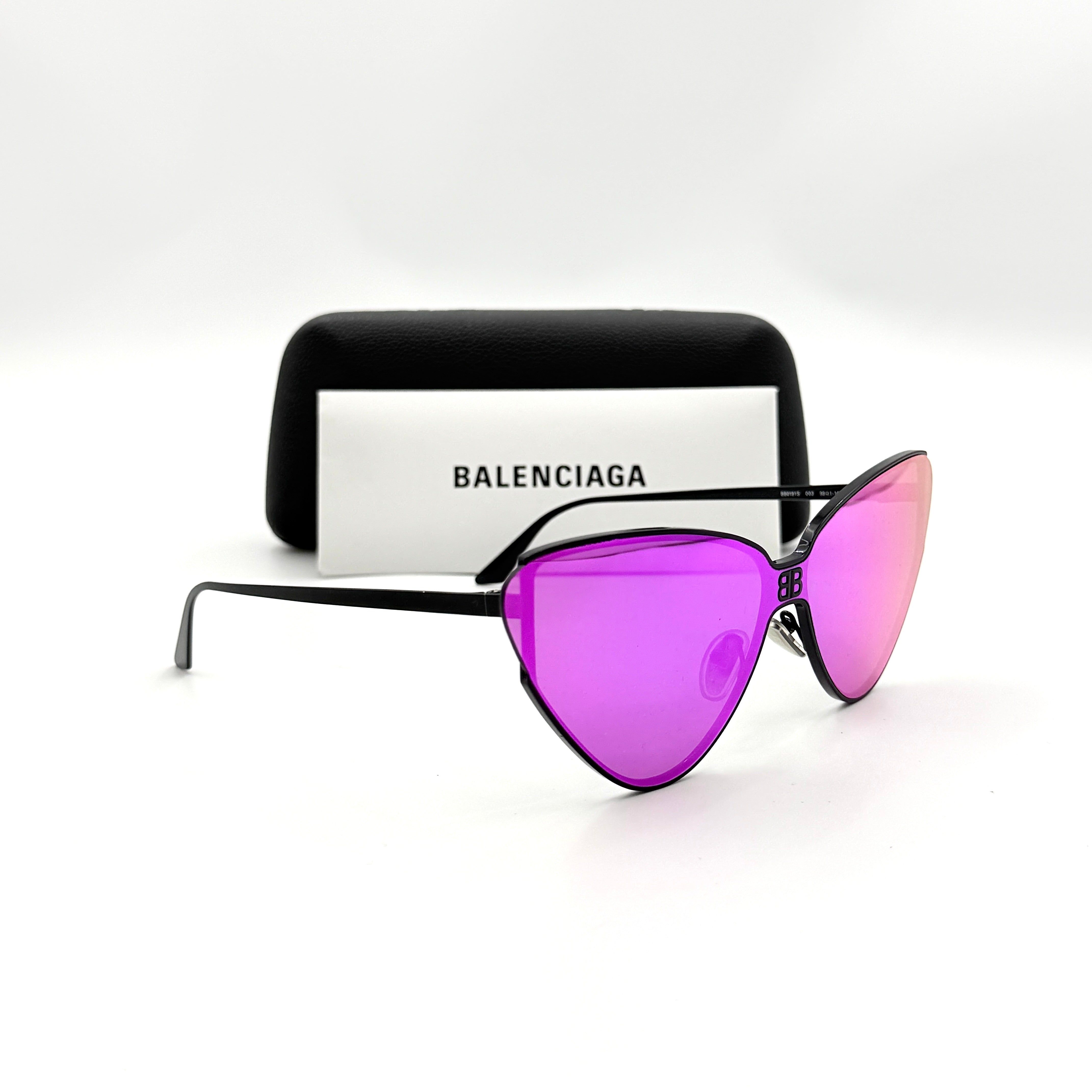 Balenciaga cat-eye sunglasses with purple mirrored lenses and black frame, featuring signature BB logo at the bridge.