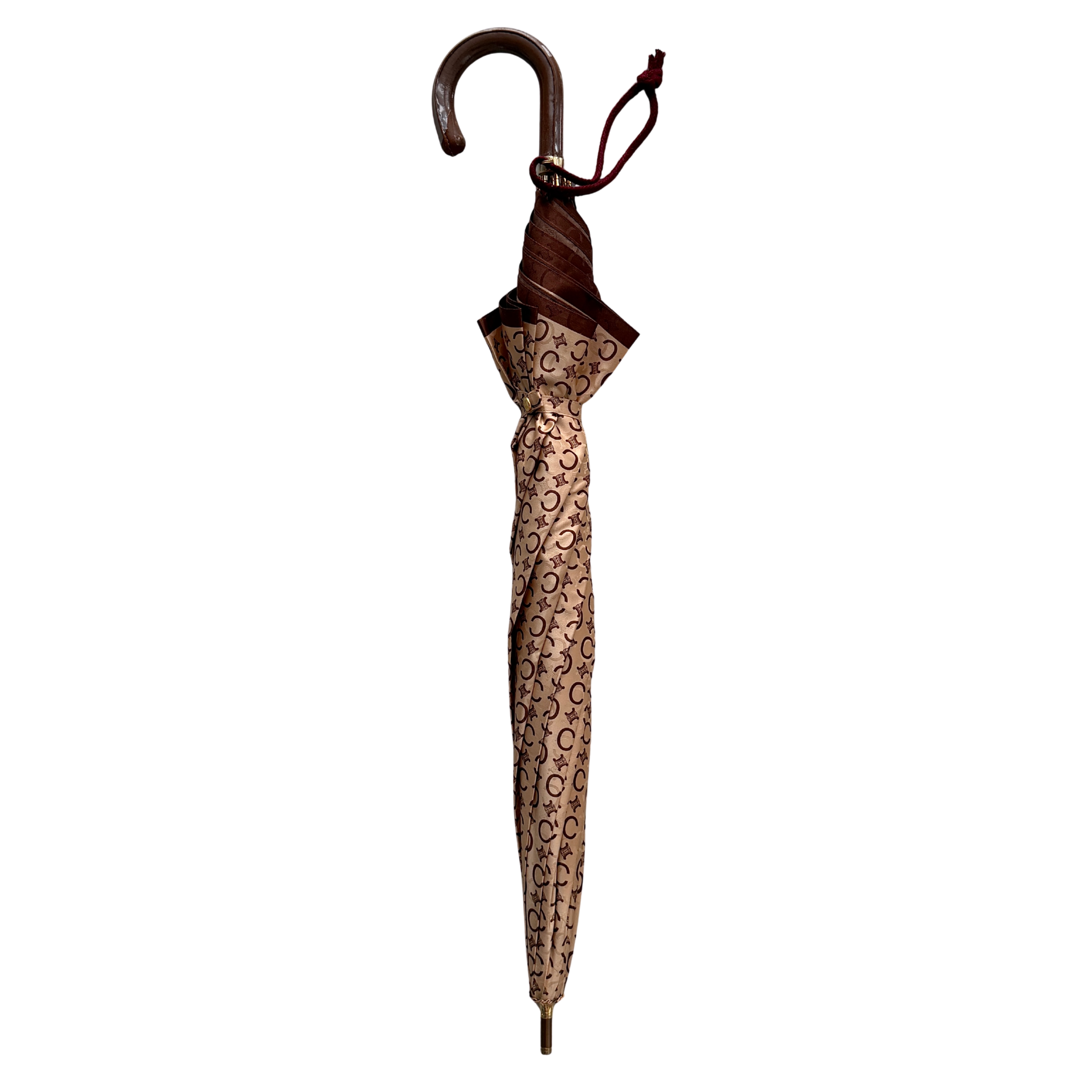 Celine Macadam Monogram Umbrella in brown and beige with classic curved handle and signature all-over logo pattern.