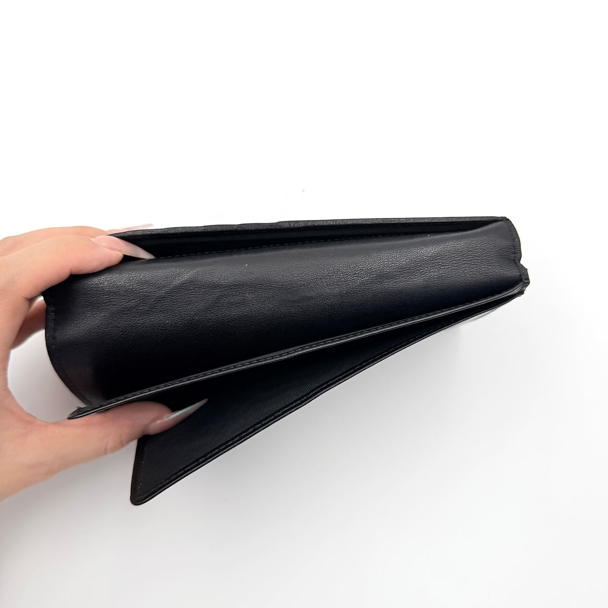 Gucci Guccissima GG embossed long wallet in black leather with box and care card.