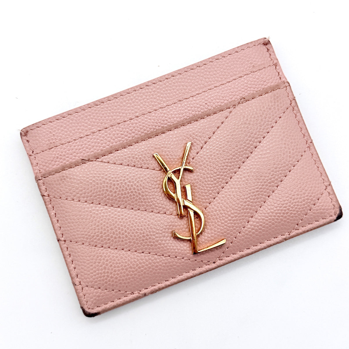 Saint Laurent YSL Cassandre Matelassé card holder in pink grained leather with gold YSL monogram.