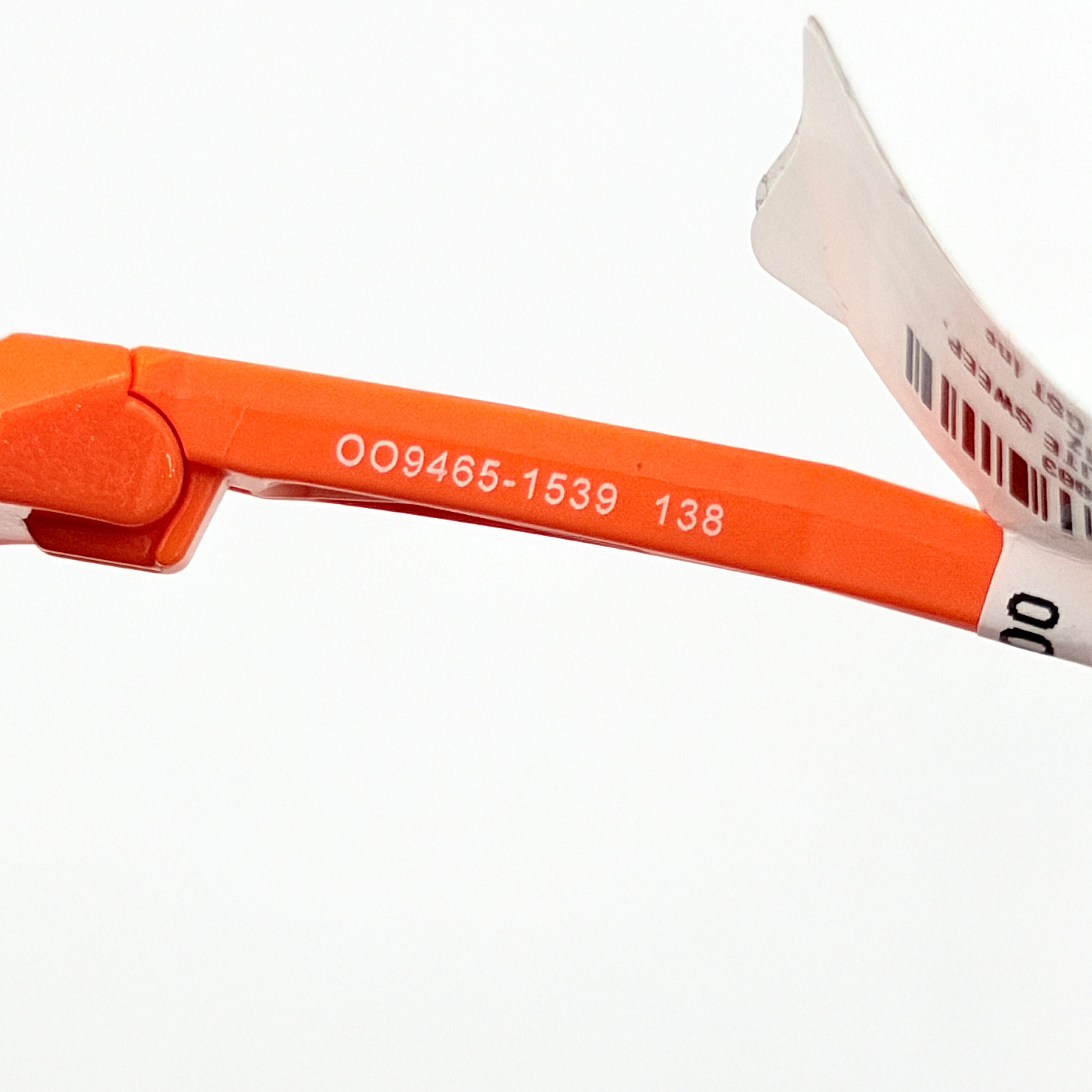 Oakley Sutro Lite Sweep MVDP Prizm Road sunglasses in orange sparkle with a shield lens and original pouch, photographed in bright studio lighting.