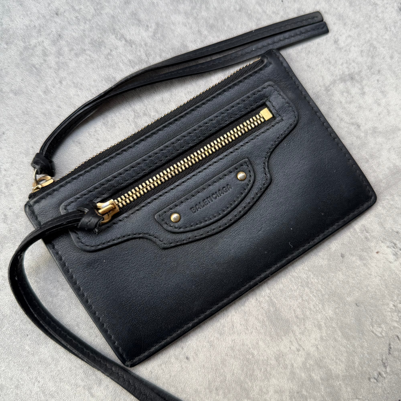 Balenciaga Neo Classic Zip Card Holder in black leather with gold-tone zip detail and moto-style front pocket