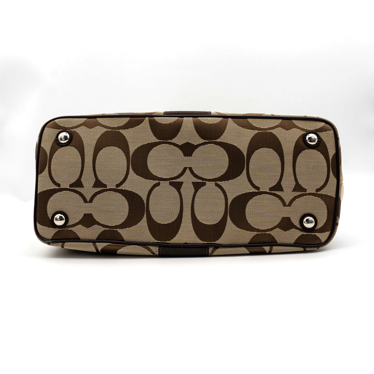Coach Signature Stripe Frame Kisslock Shoulder Bag in beige and brown canvas with leather trim and signature monogram pattern.