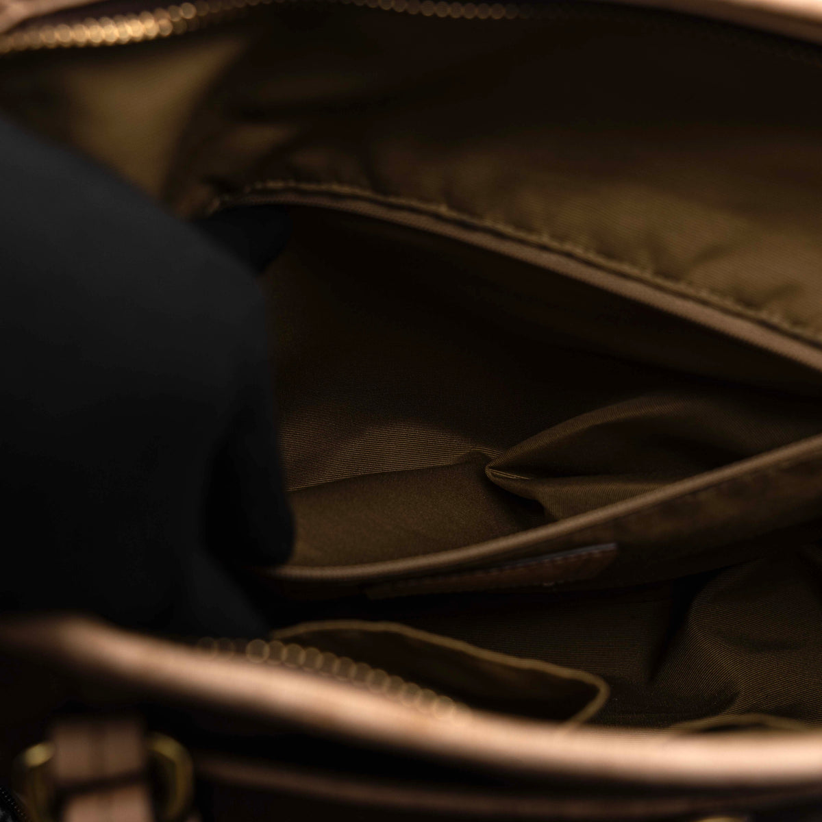 Coach Signature Peyton Pocket tote bag in brown canvas with tan leather trim, shown with both handles and detachable strap.