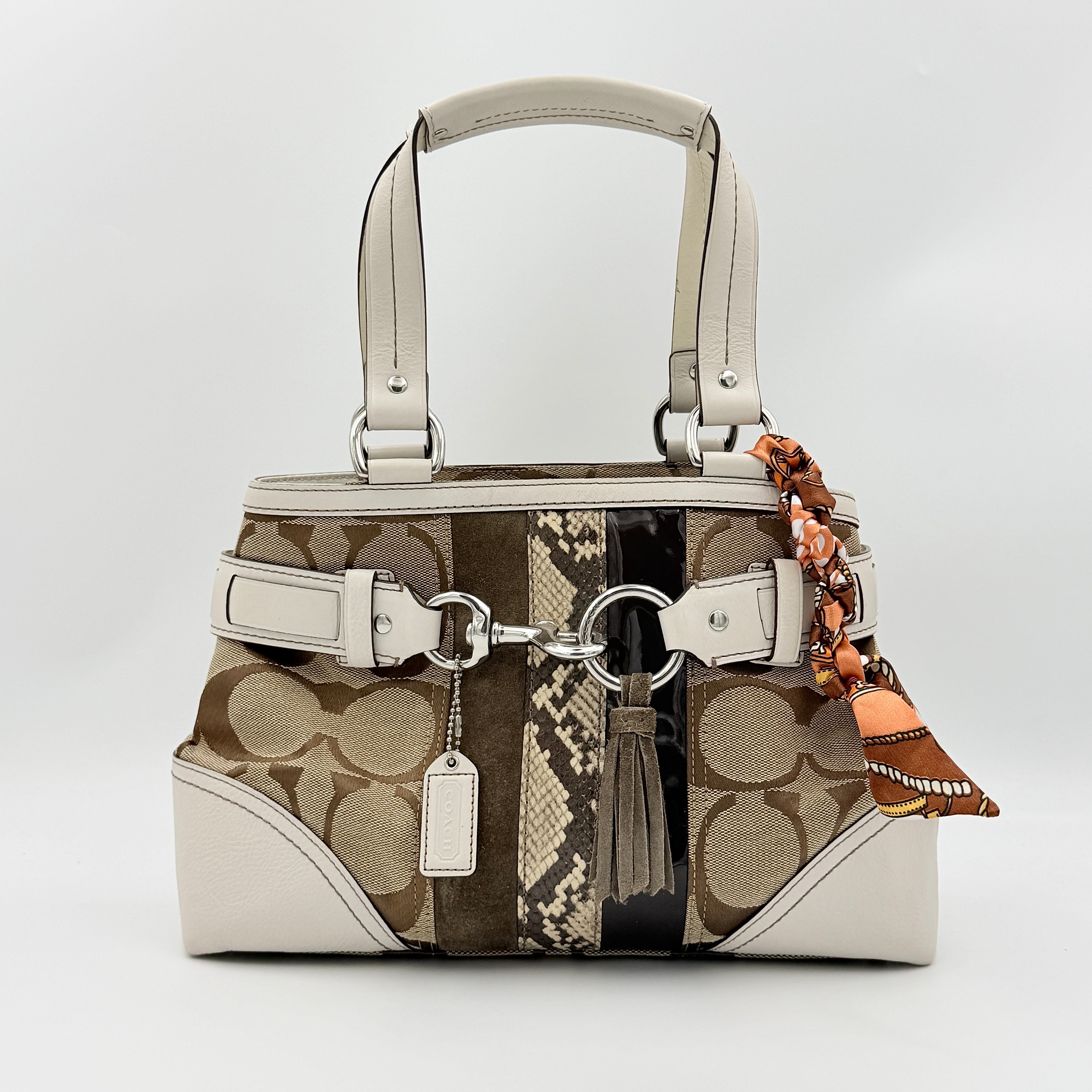 Coach Signature Hampton Python Stripe Handbag in multicolour leather and canvas with silver-tone hardware and an orange scarf detail.