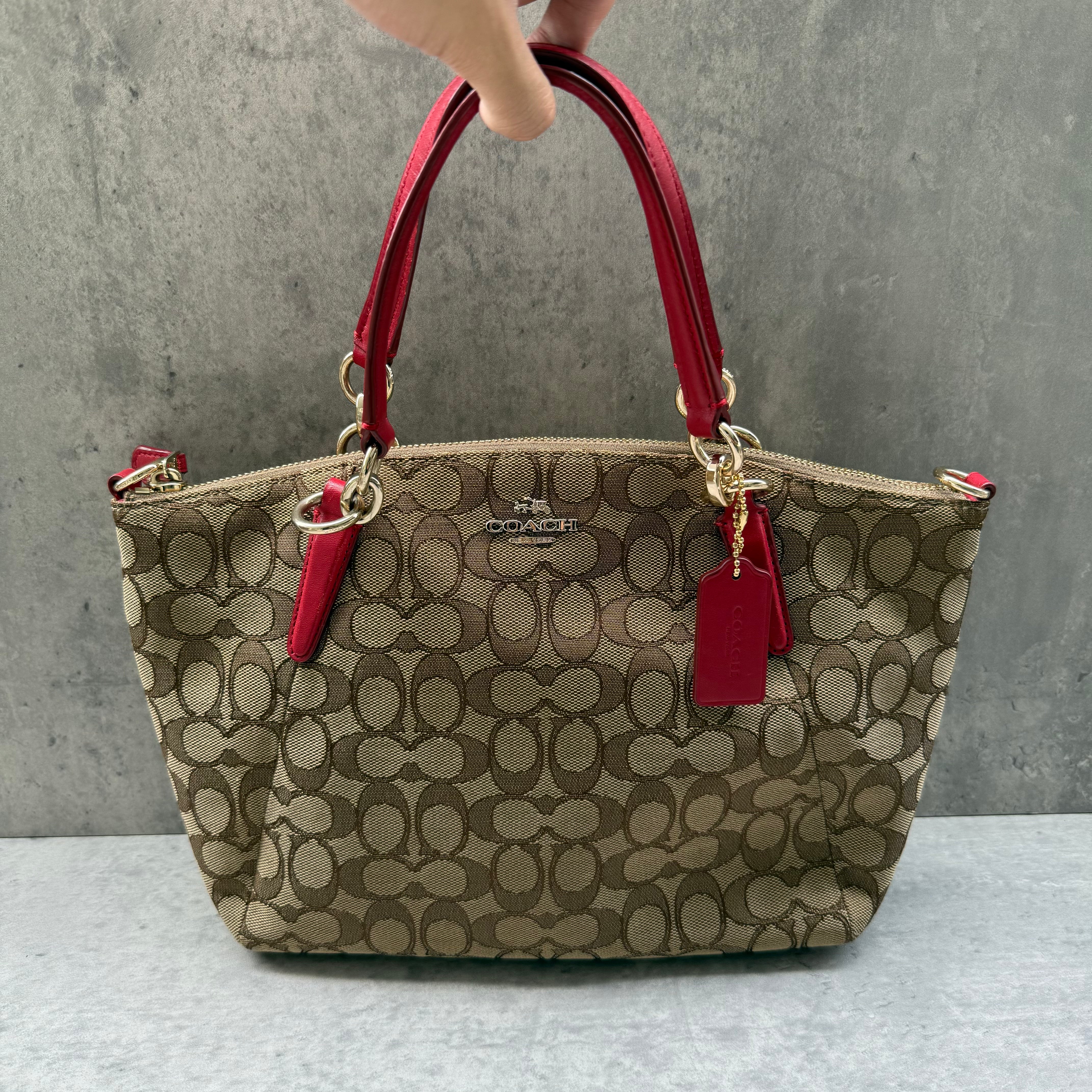 Coach 2Way Kelsey Shoulder Bag Beige/Red with signature canvas, red leather accents, gold-tone hardware, and dual carry options