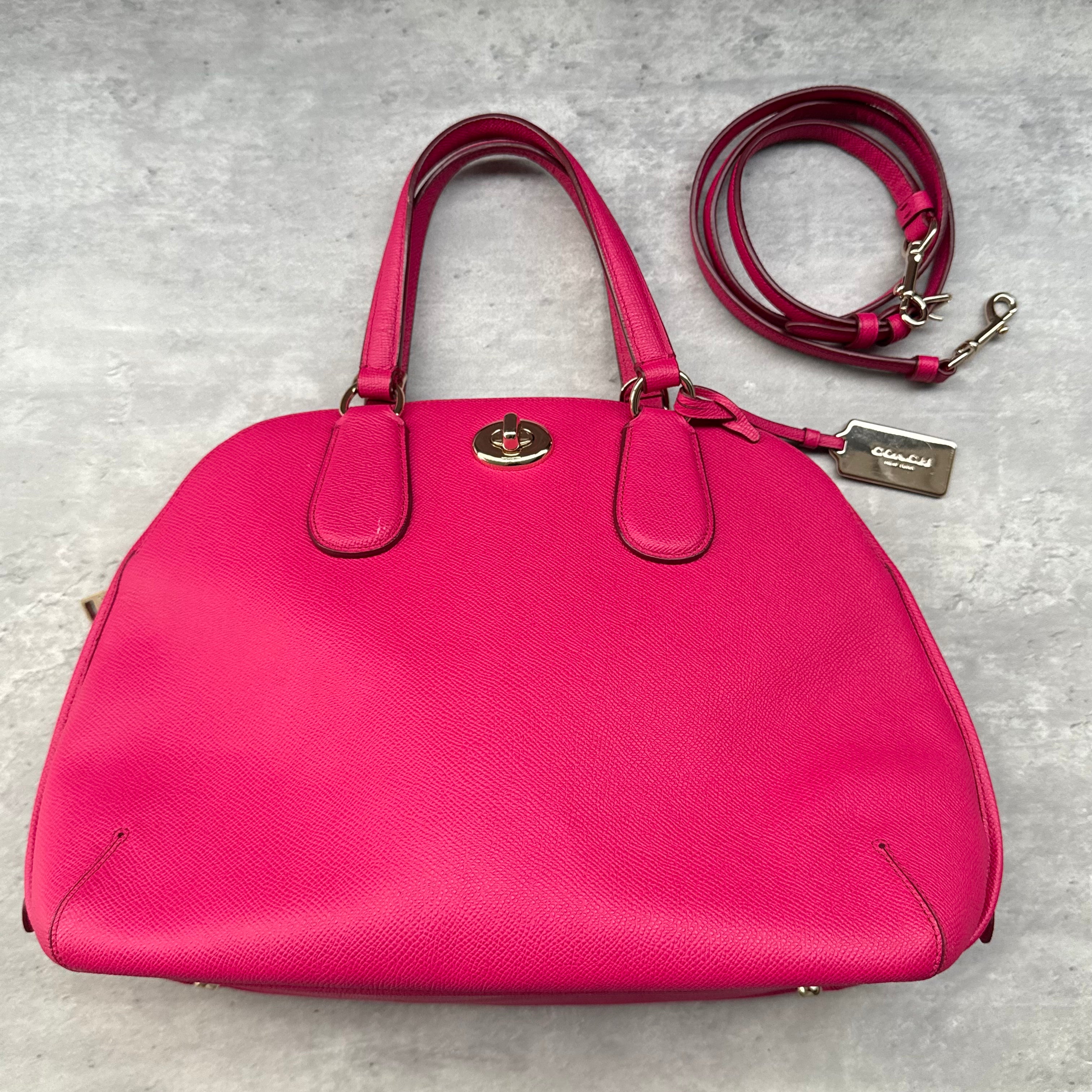 Coach 2Way Prince Street Handbag in pink pebbled leather with gold-tone hardware and detachable strap.