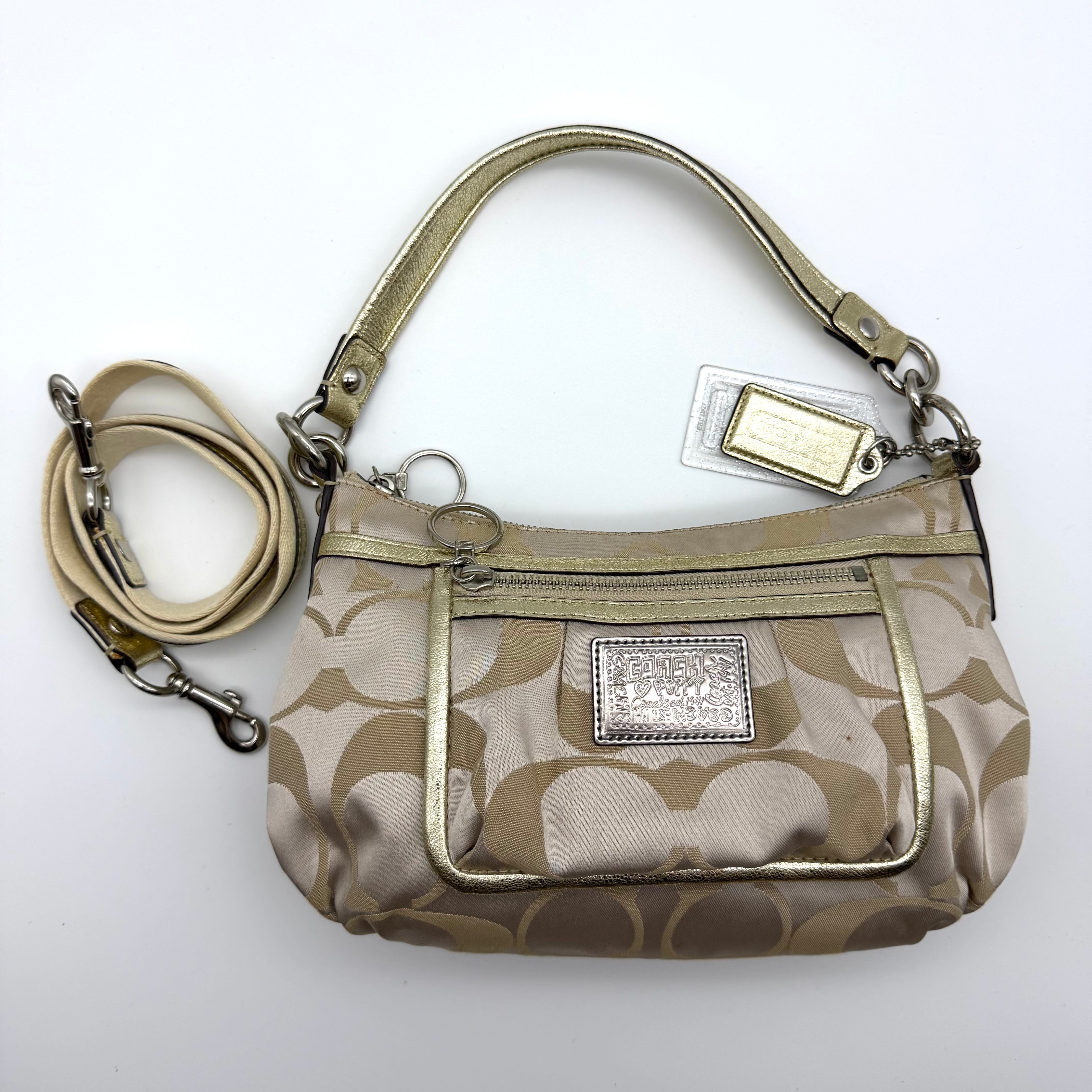 Coach 2-Way Signature shoulder bag in cream jacquard with gold leather trim, front zip pocket, and pink lining — pre-loved.