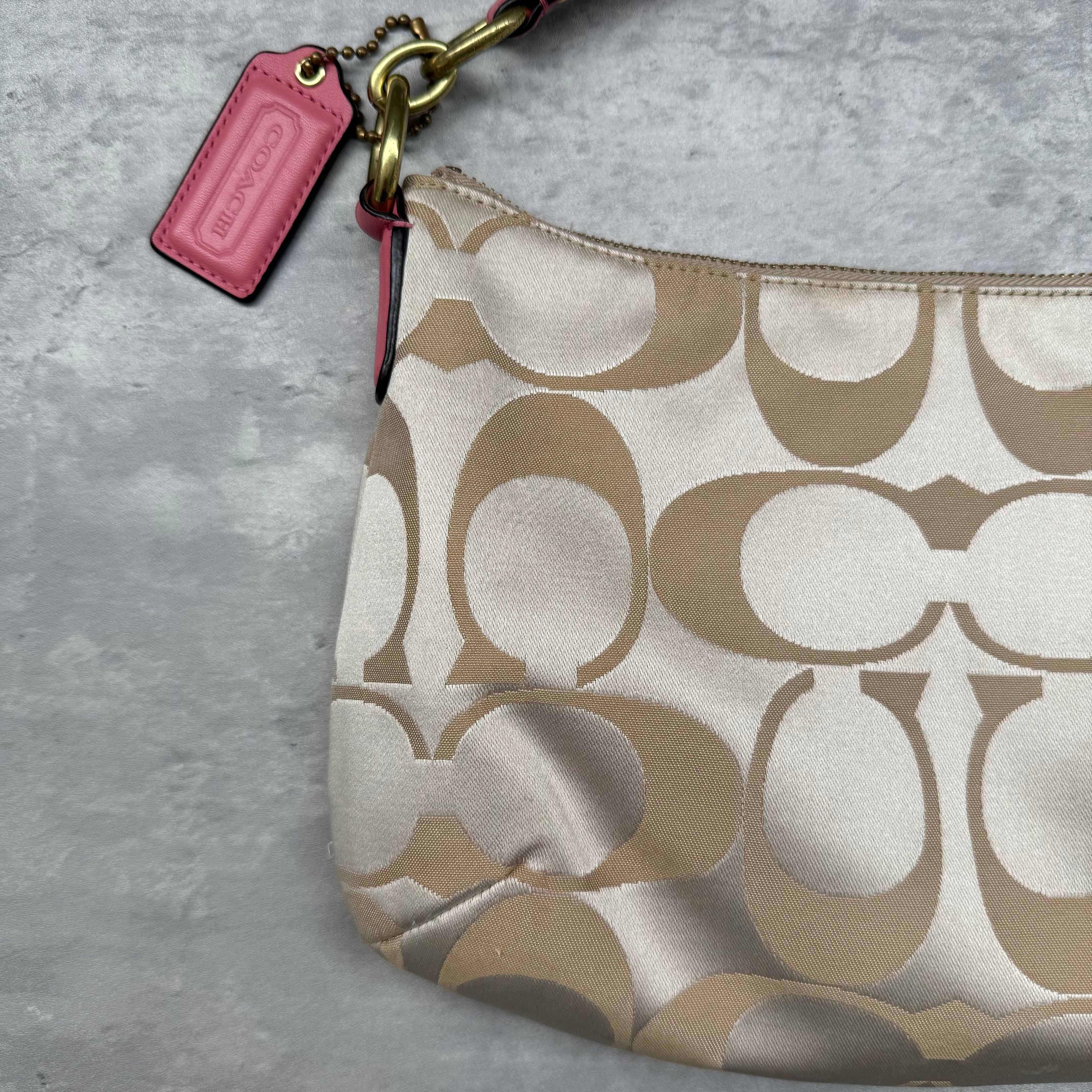 Coach 2Way Signature Shoulder Bag Cream/Pink with gold-tone turn-lock, pink leather trim, and cream monogram canvas