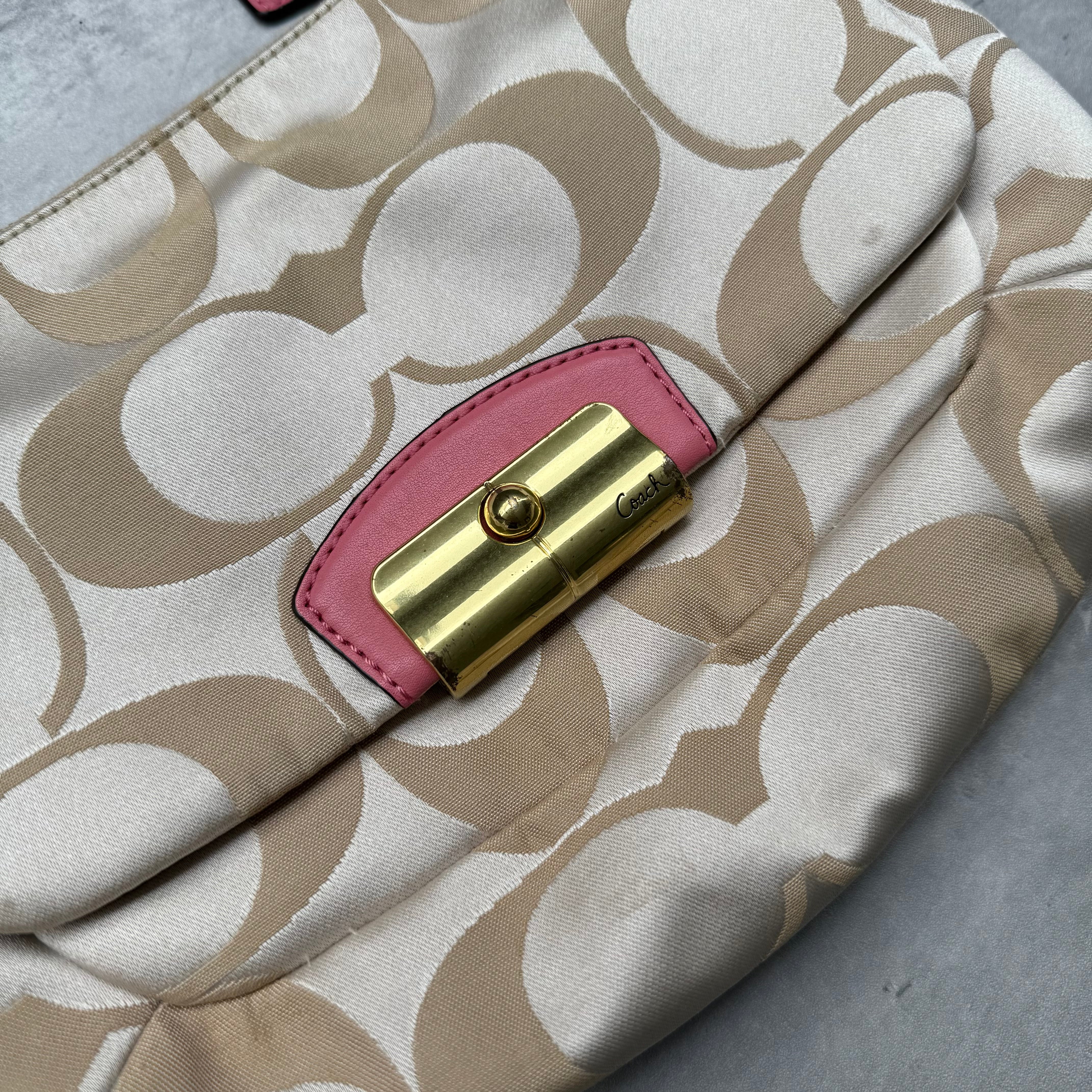 Coach 2Way Signature Shoulder Bag Cream/Pink with gold-tone turn-lock, pink leather trim, and cream monogram canvas