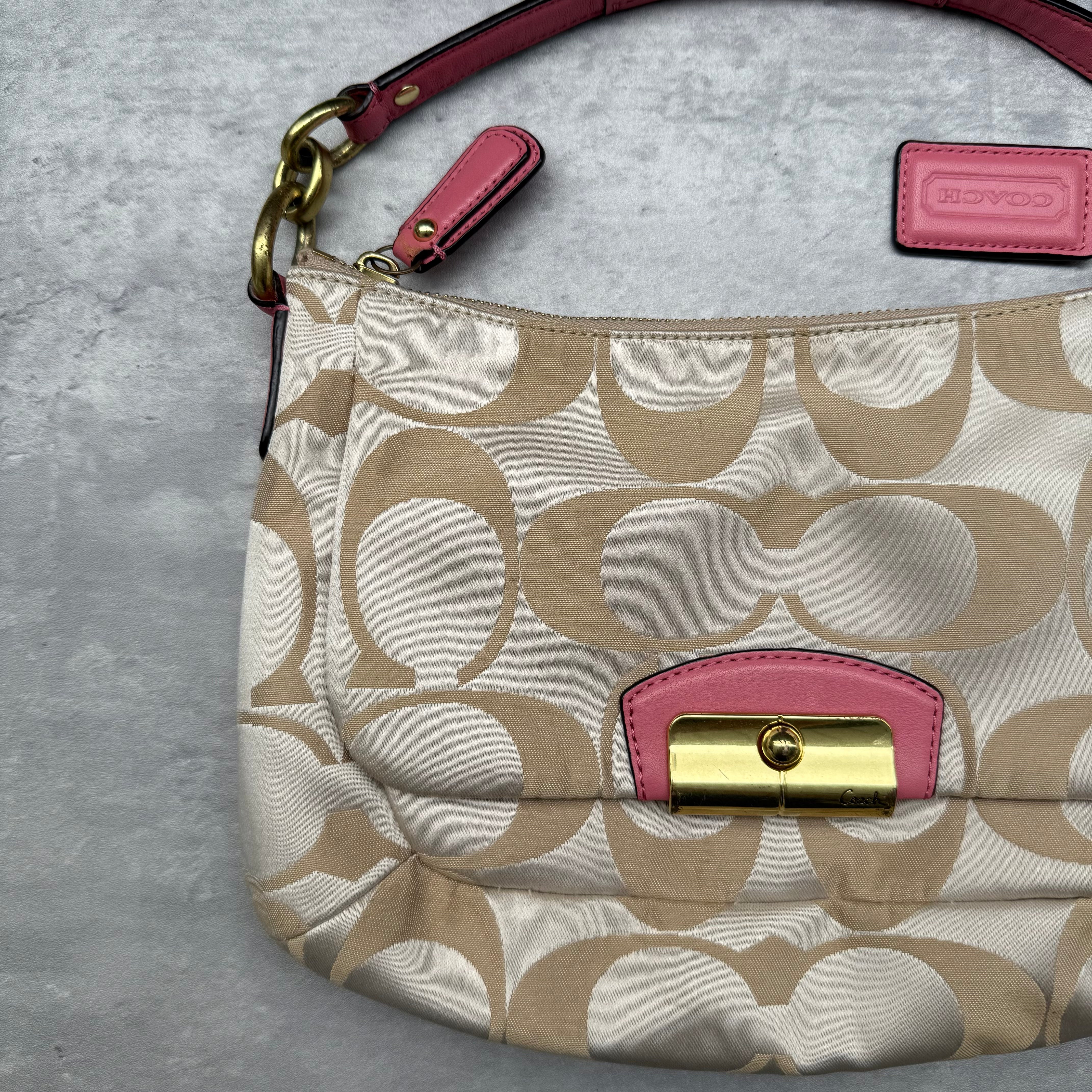 Coach 2Way Signature Shoulder Bag Cream/Pink with gold-tone turn-lock, pink leather trim, and cream monogram canvas