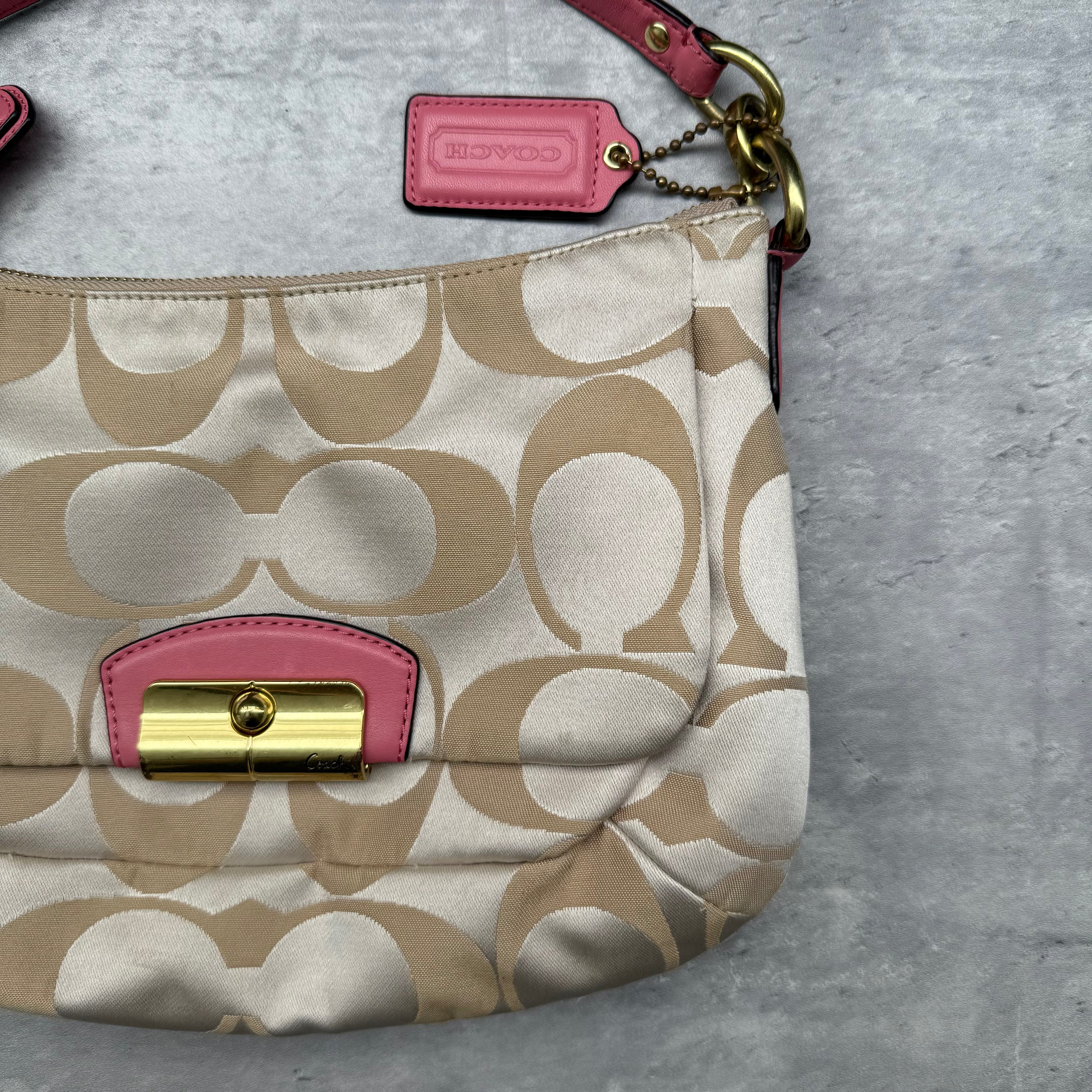 Coach 2Way Signature Shoulder Bag Cream/Pink with gold-tone turn-lock, pink leather trim, and cream monogram canvas