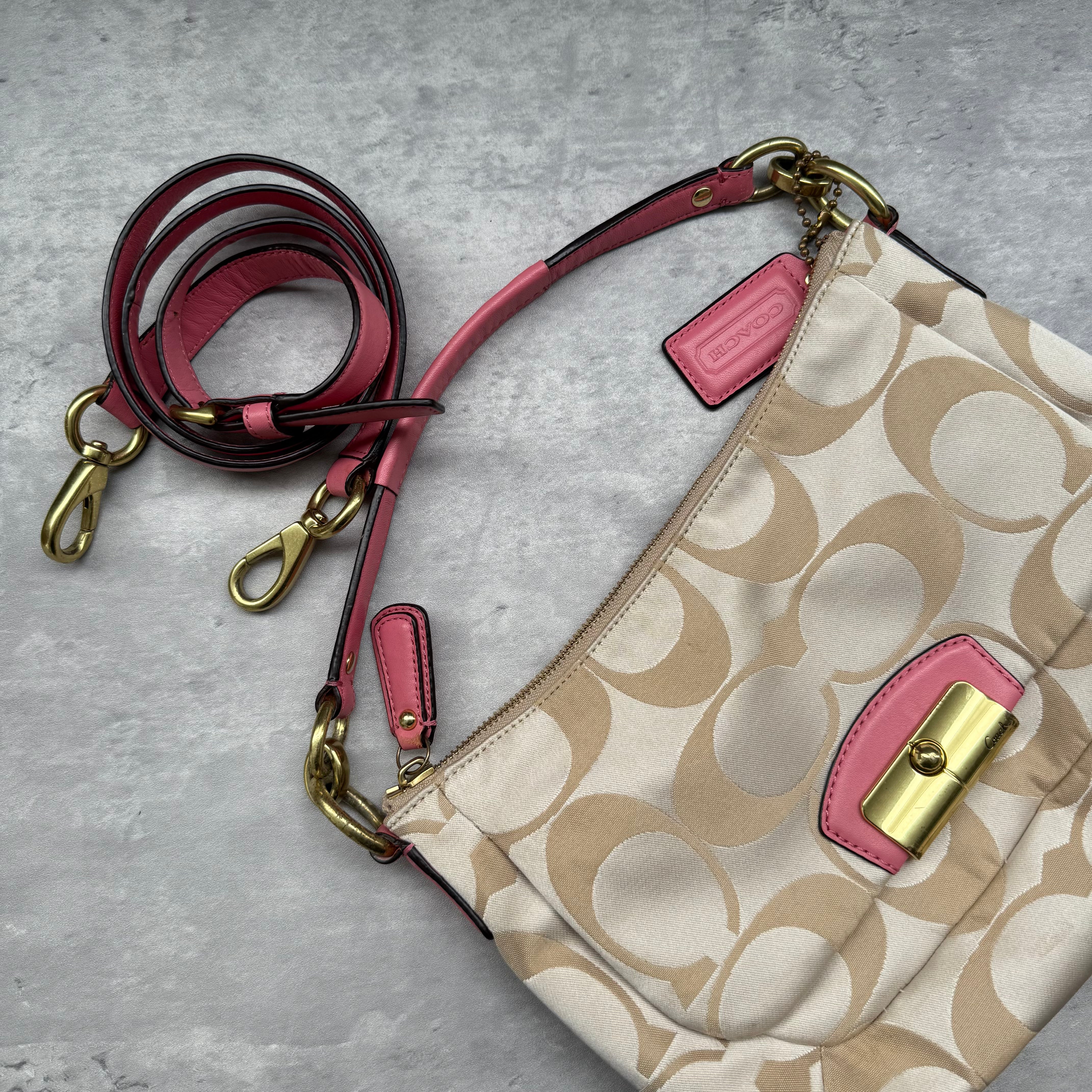 Coach 2Way Signature Shoulder Bag Cream/Pink with gold-tone turn-lock, pink leather trim, and cream monogram canvas