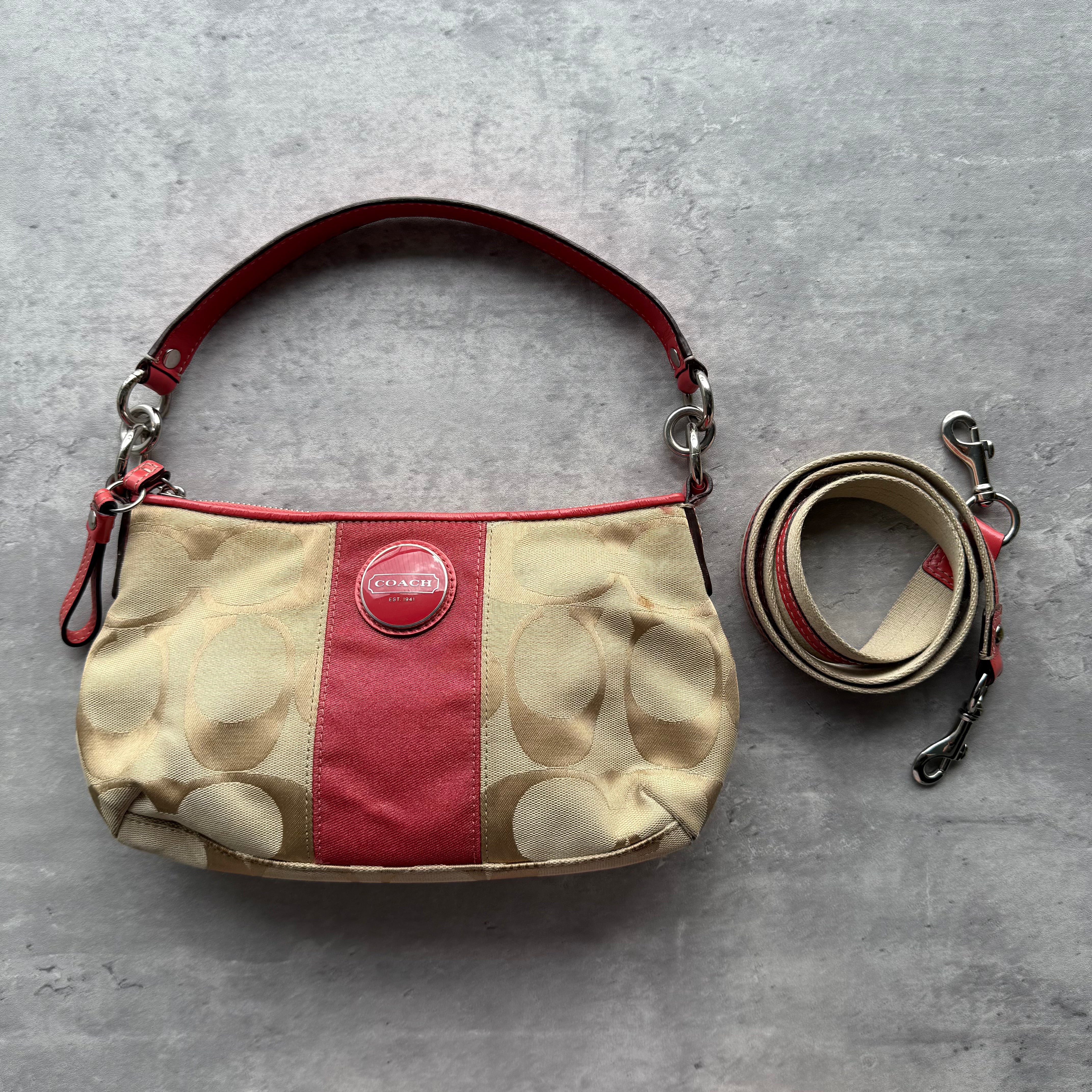  Coach 2Way Signature Stripe Shoulder Bag in beige and red, crafted from jacquard canvas with red leather trim and silver-tone hardware.