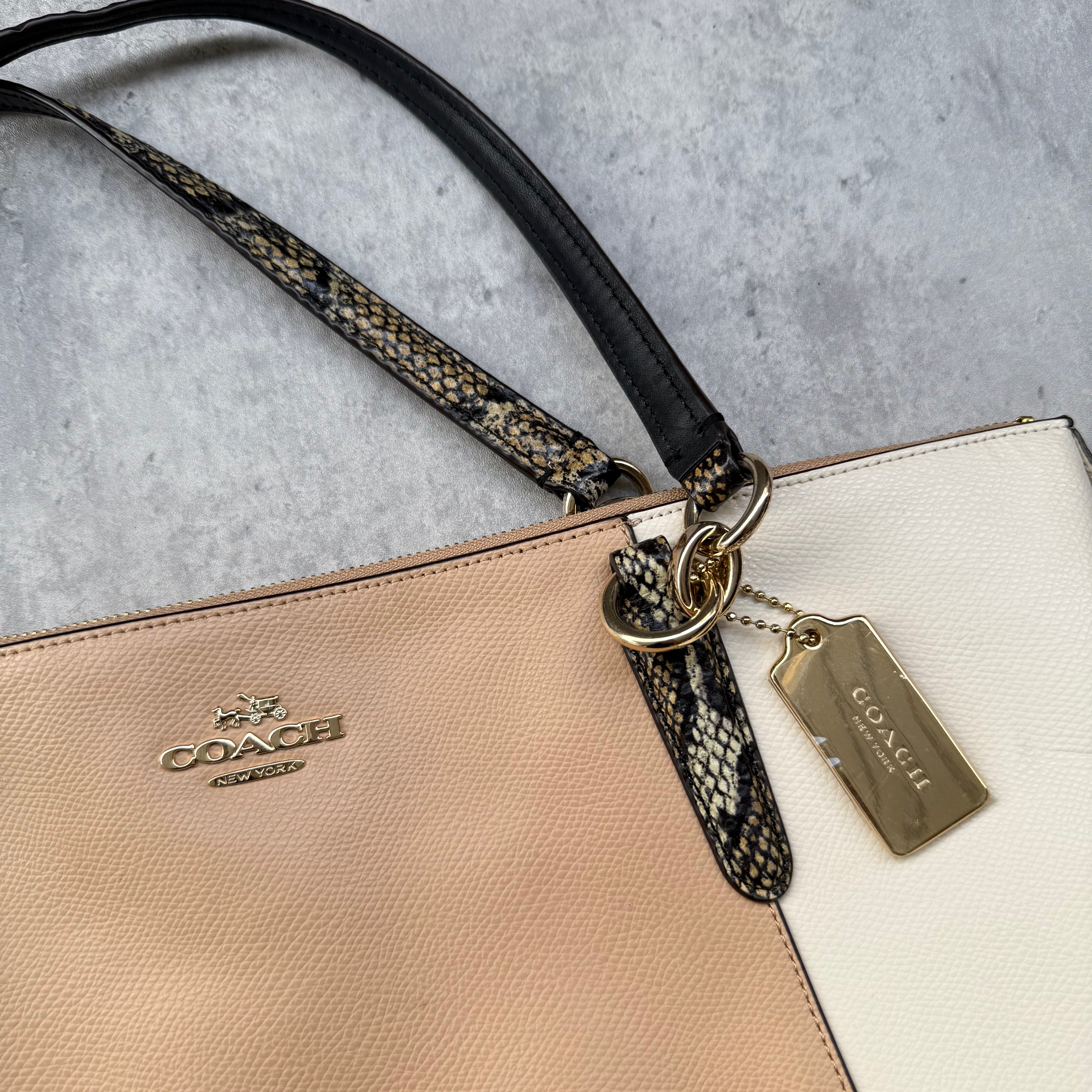 Coach AVA Tote Handbag with beige and cream leather panels, snakeskin-trim handles, and gold-tone logo hardware
