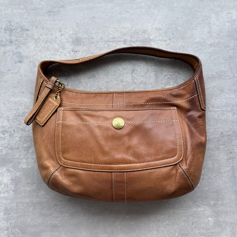 Vintage Coach Ergo Hobo Shoulder Bag in brown leather with gold-tone hardware, contrast stitching, front pocket, and zip closure