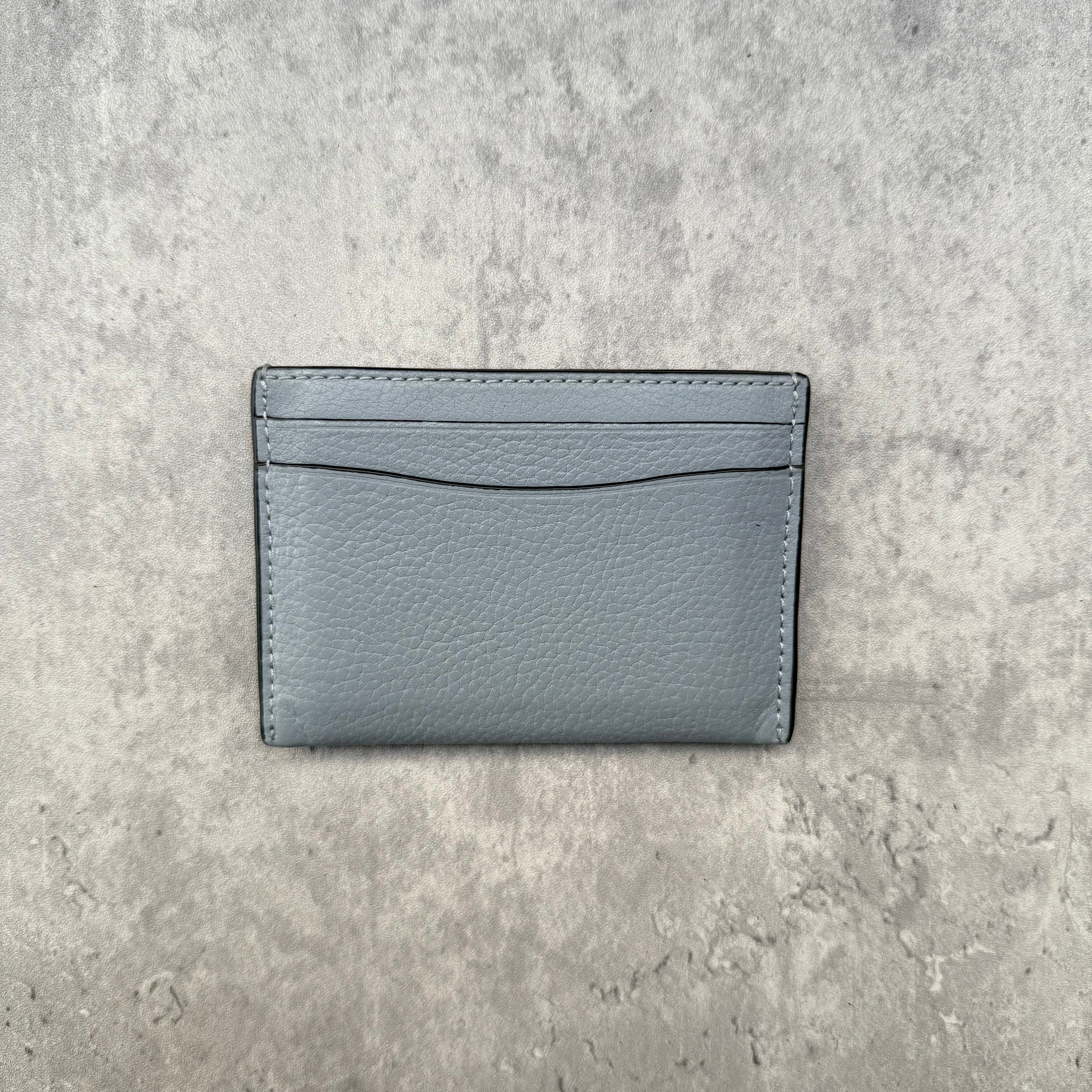 Coach Essential Cardholder Baby Blue in pebbled leather with silver-tone Coach C logo and card slots