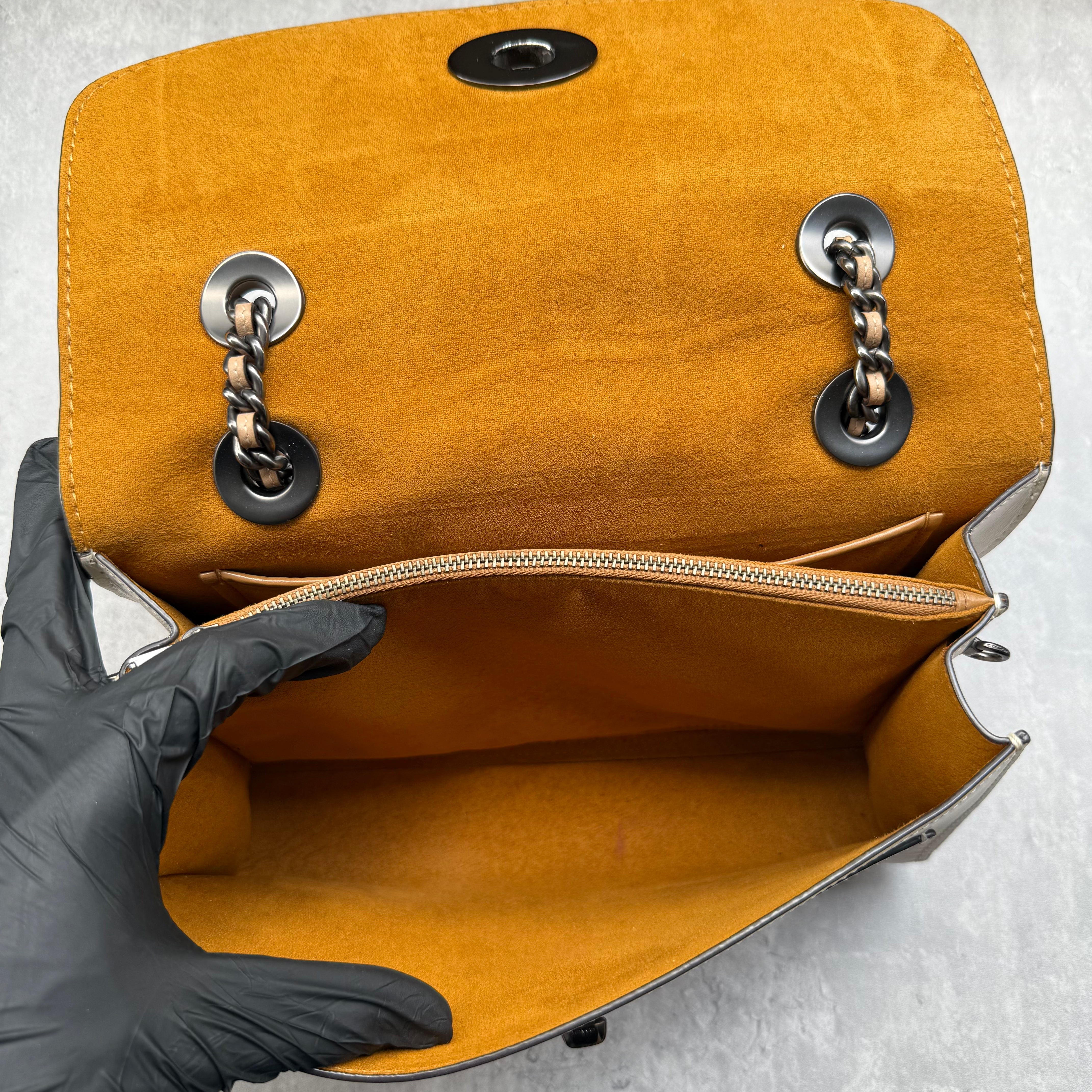 Coach Parker Multi Patch Shoulder Bag with monogram canvas, suede, leather panels, yellow suede lining, and chain leather strap.