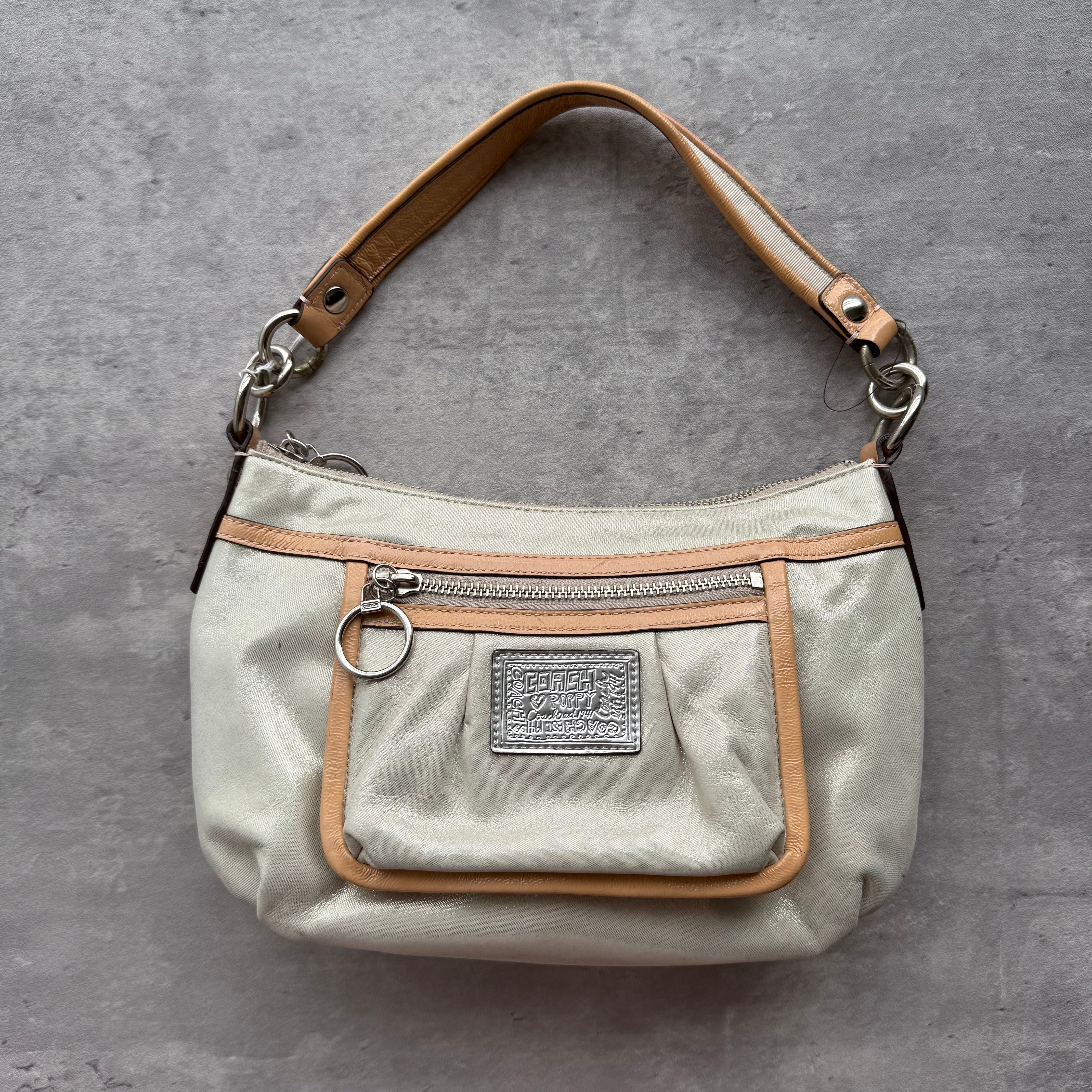 Coach 2Way Shoulder Bag in silver fabric with tan leather trim, silver-tone hardware, and pink interior lining.
