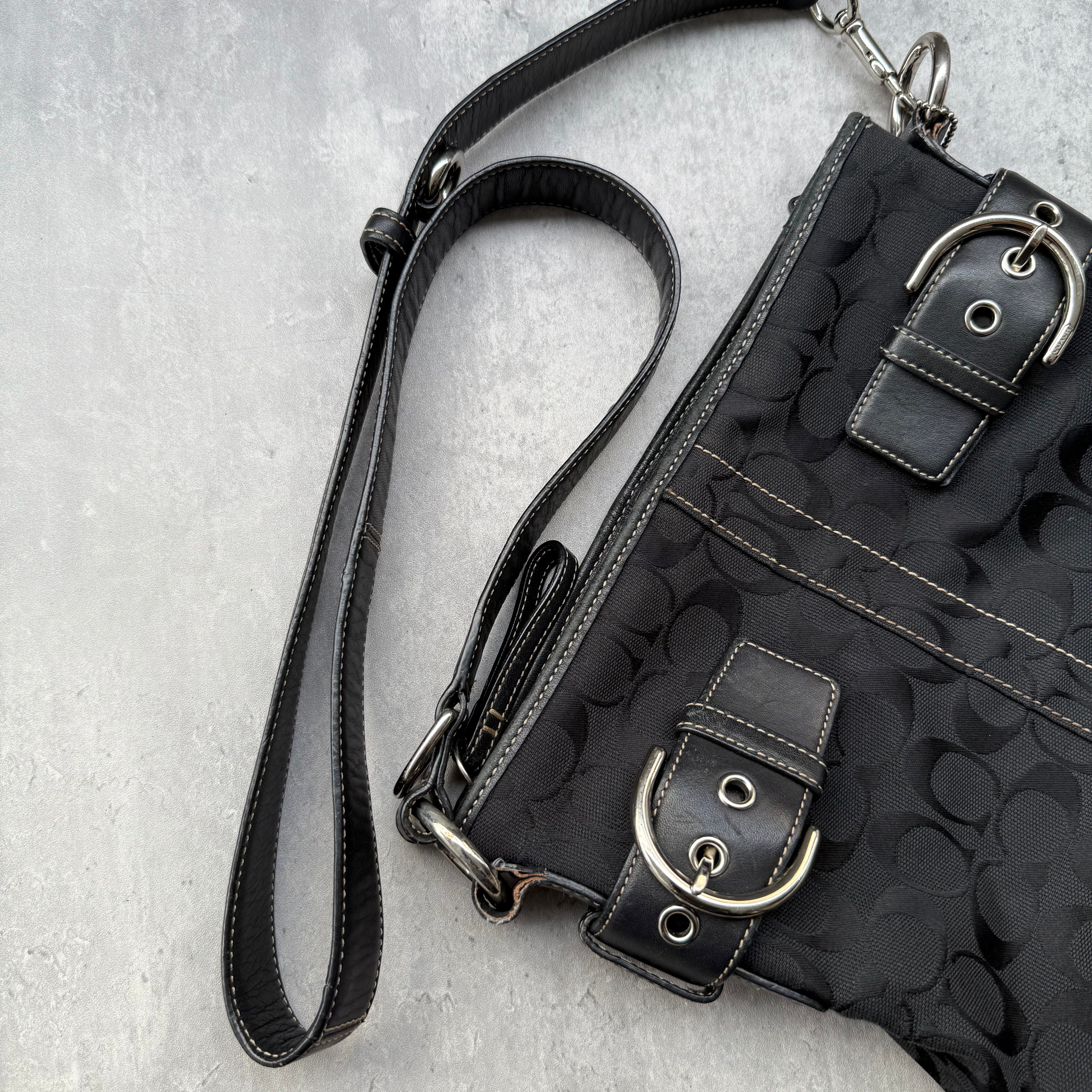 Coach Signature Canvas Crossbody Bag Black with leather trim, dual buckle detail, and silver-tone hardware