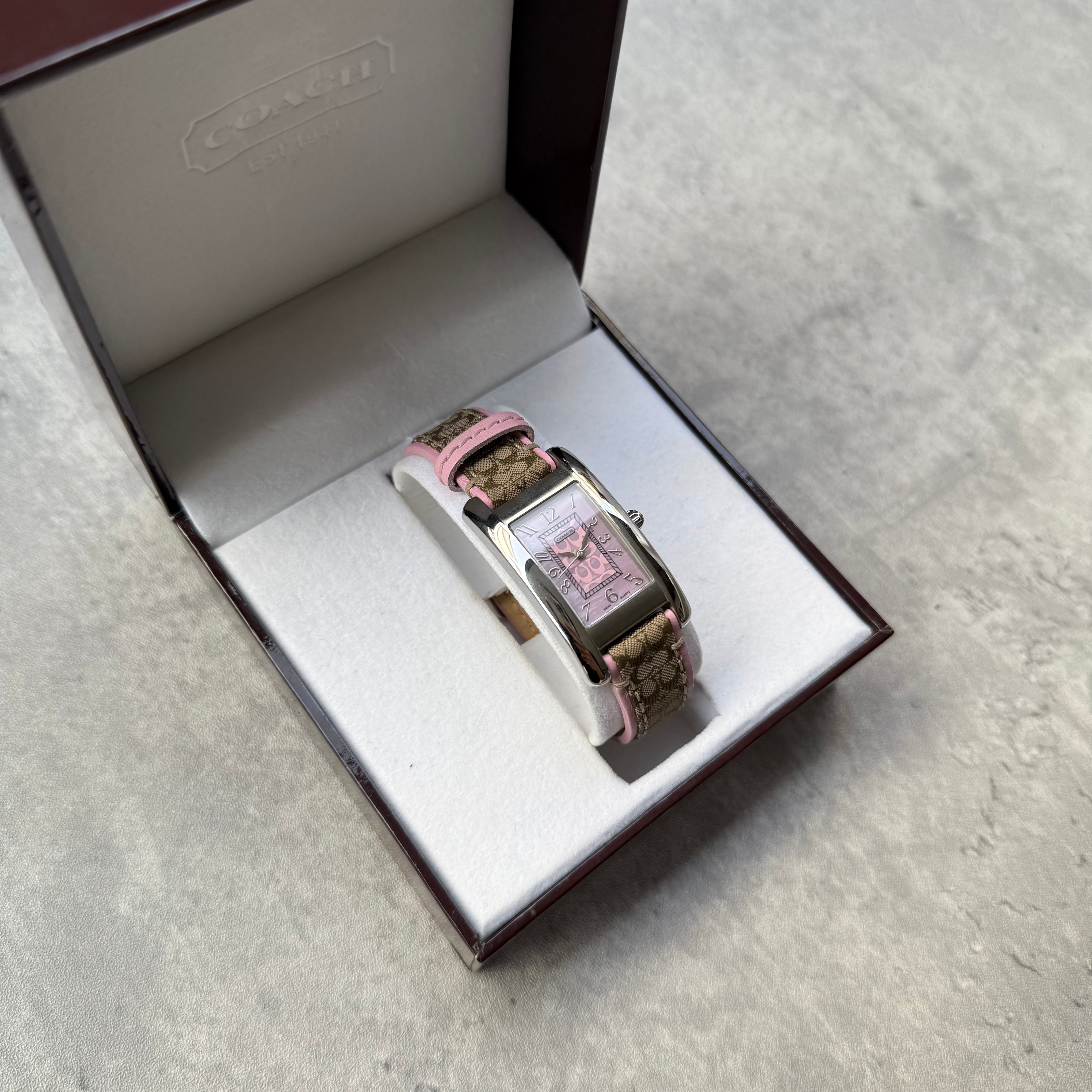 Coach Signature Canvas Watch with Pink Dial, featuring monogram strap and original Coach box