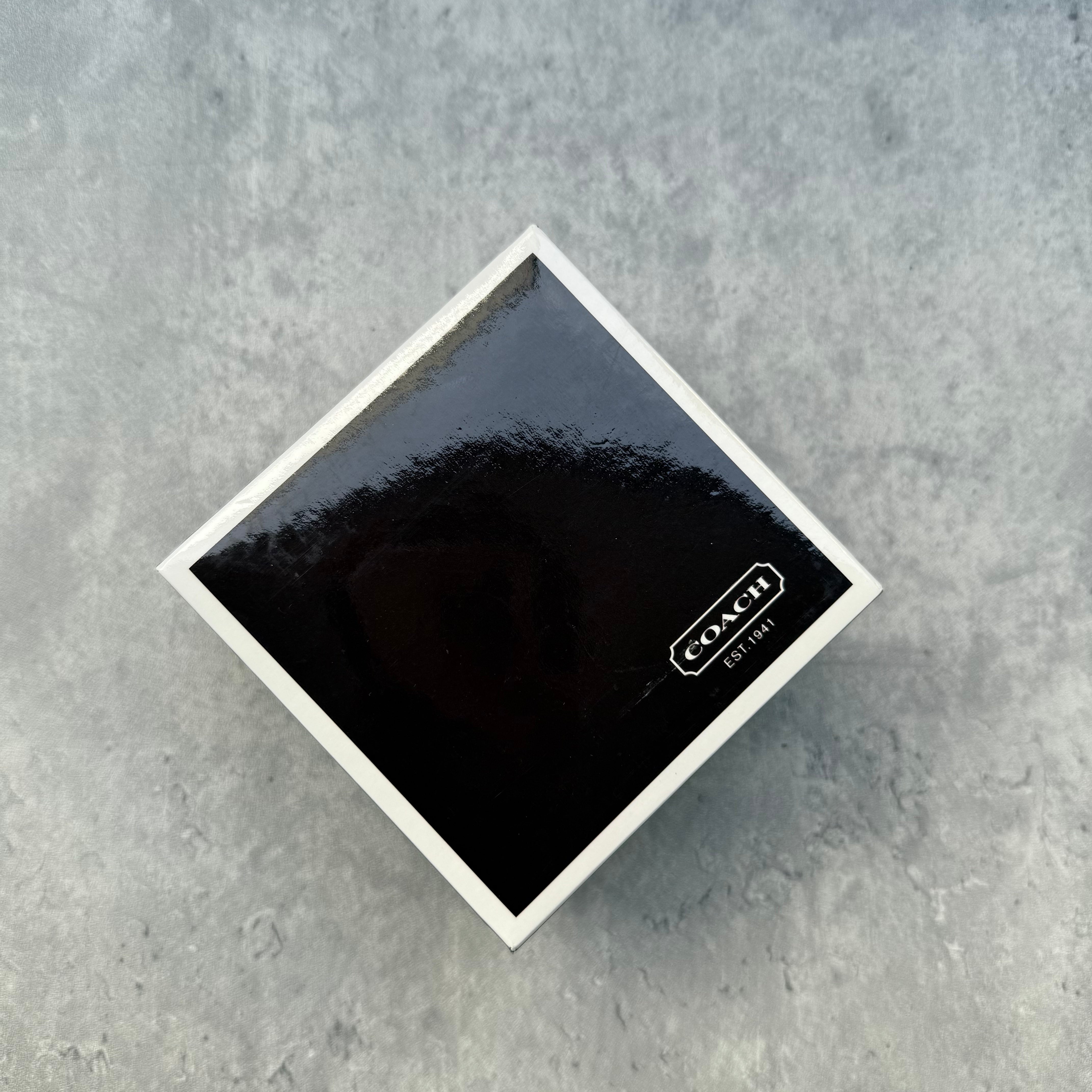 Coach Signature Canvas Watch with Pink Dial, featuring monogram strap and original Coach box