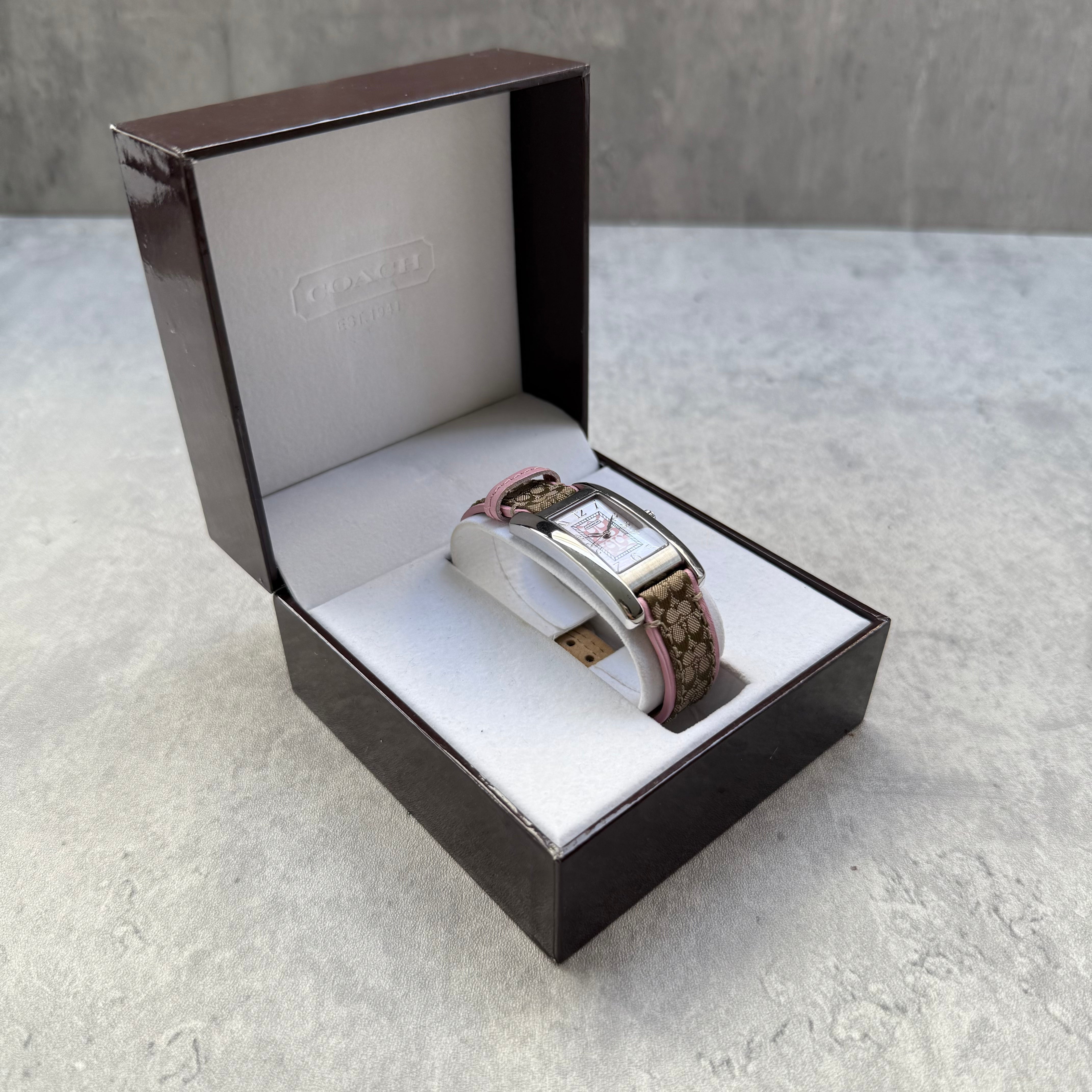 Coach Signature Canvas Watch with Pink Dial, featuring monogram strap and original Coach box