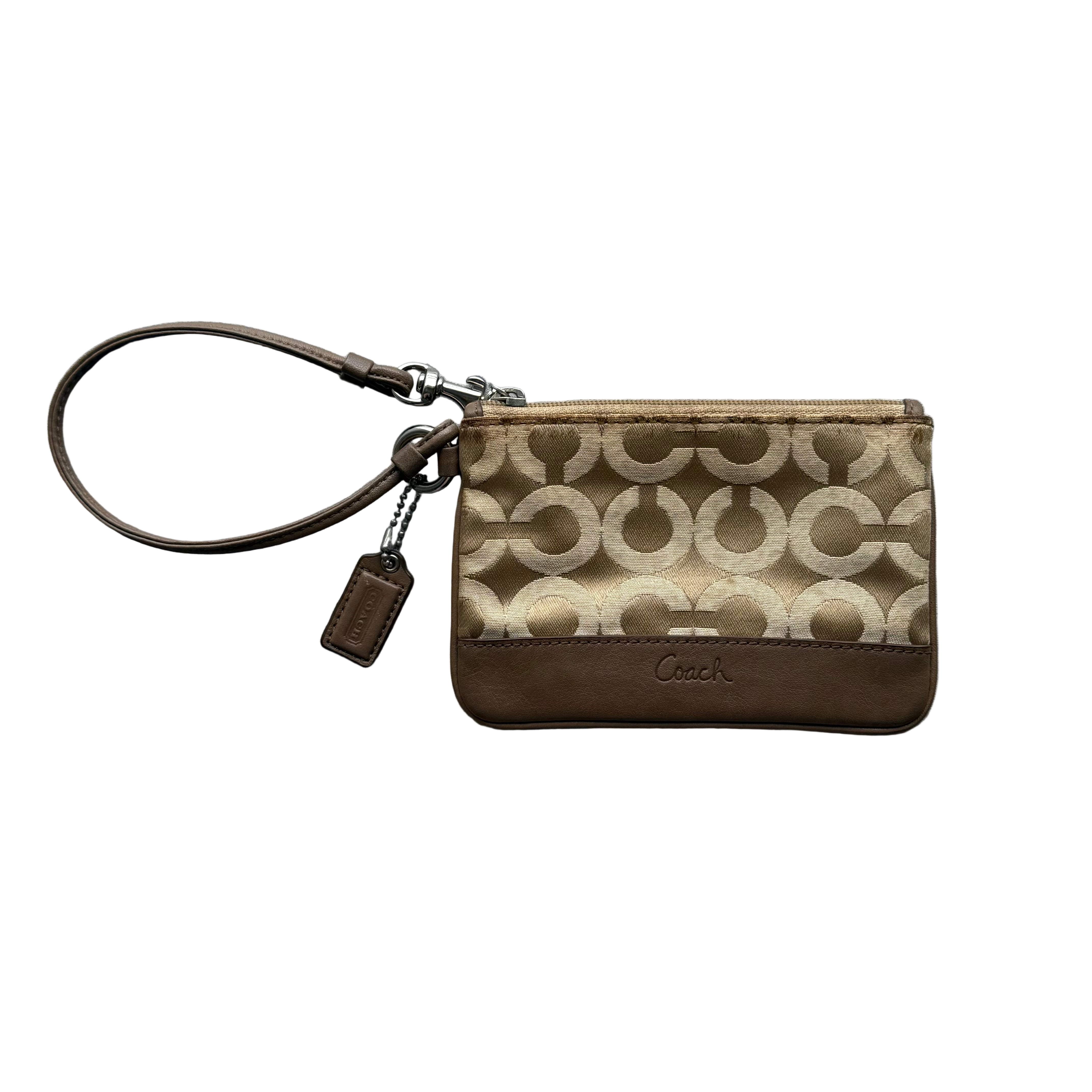 Coach Signature Canvas Wristlet in brown and tan with leather trim, detachable wrist strap, and zipper closure.