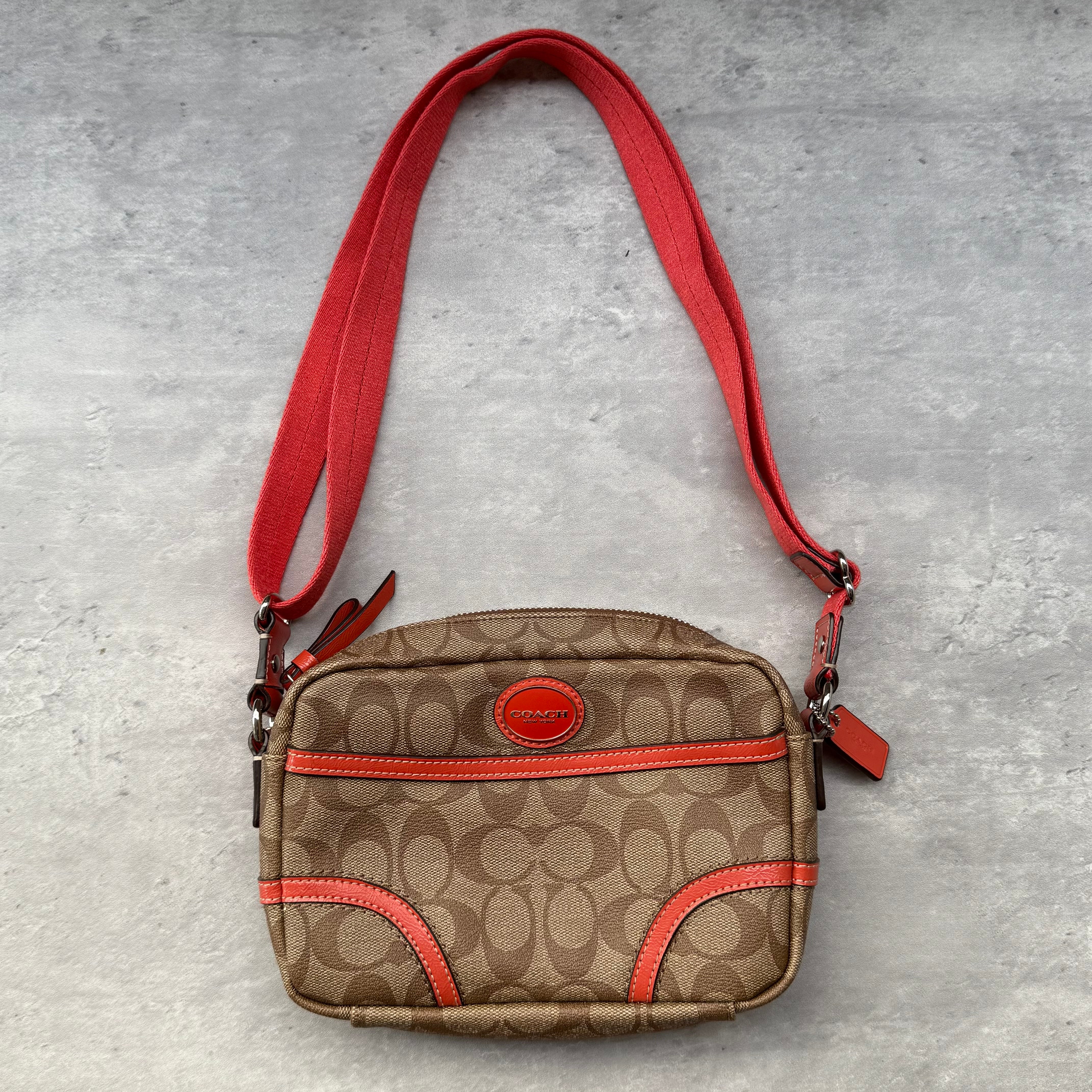 Coach Signature Crossbody Messenger Bag Beige/Orange with monogram canvas, orange leather trim, and wide orange canvas strap