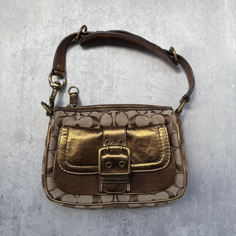 Coach Signature Shoulder Bag in beige canvas with gold metallic front buckle pocket, brown suede accents, and short strap.