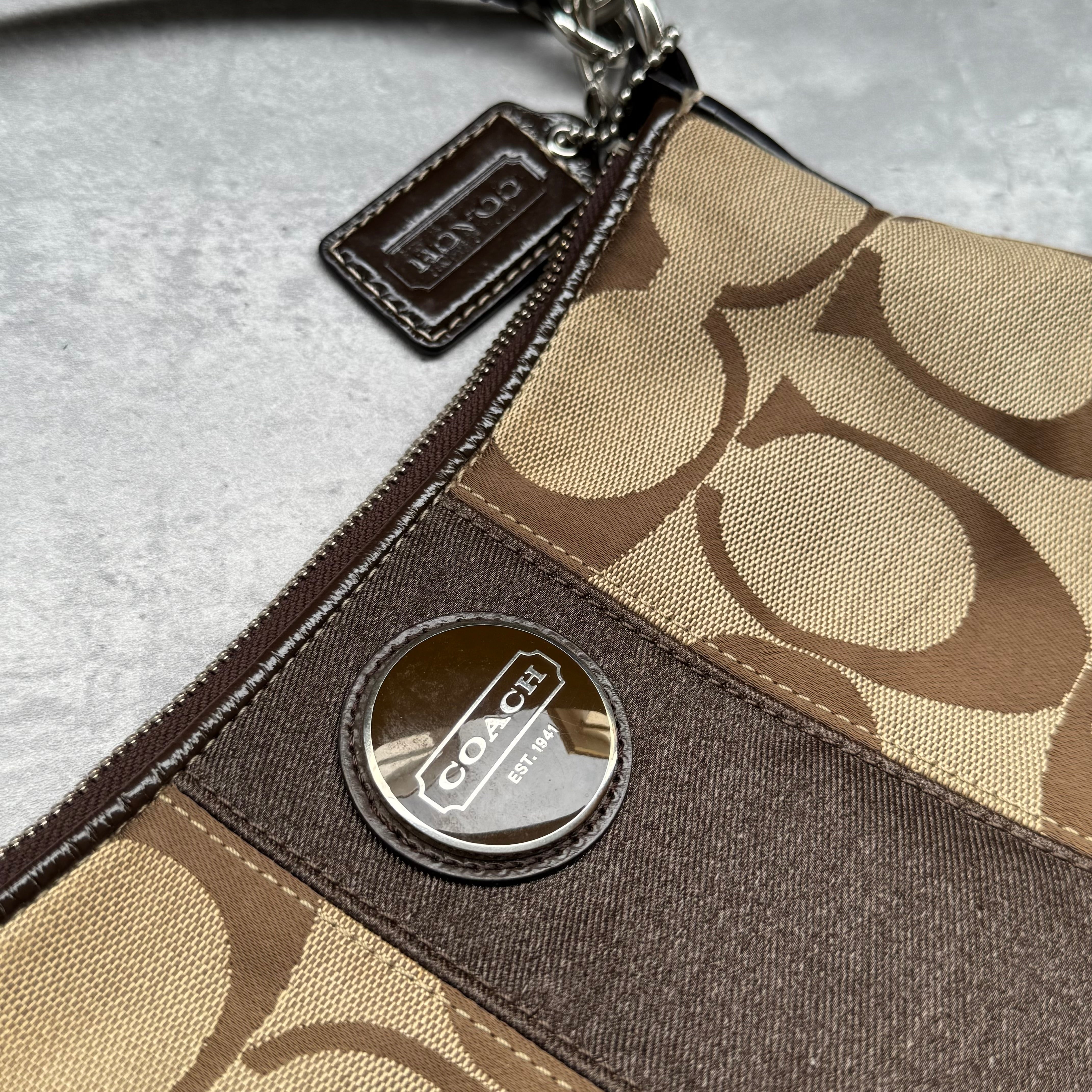 Coach Signature Stripe Shoulder Bag in beige and brown monogram canvas with dark brown leather trim and detachable strap.